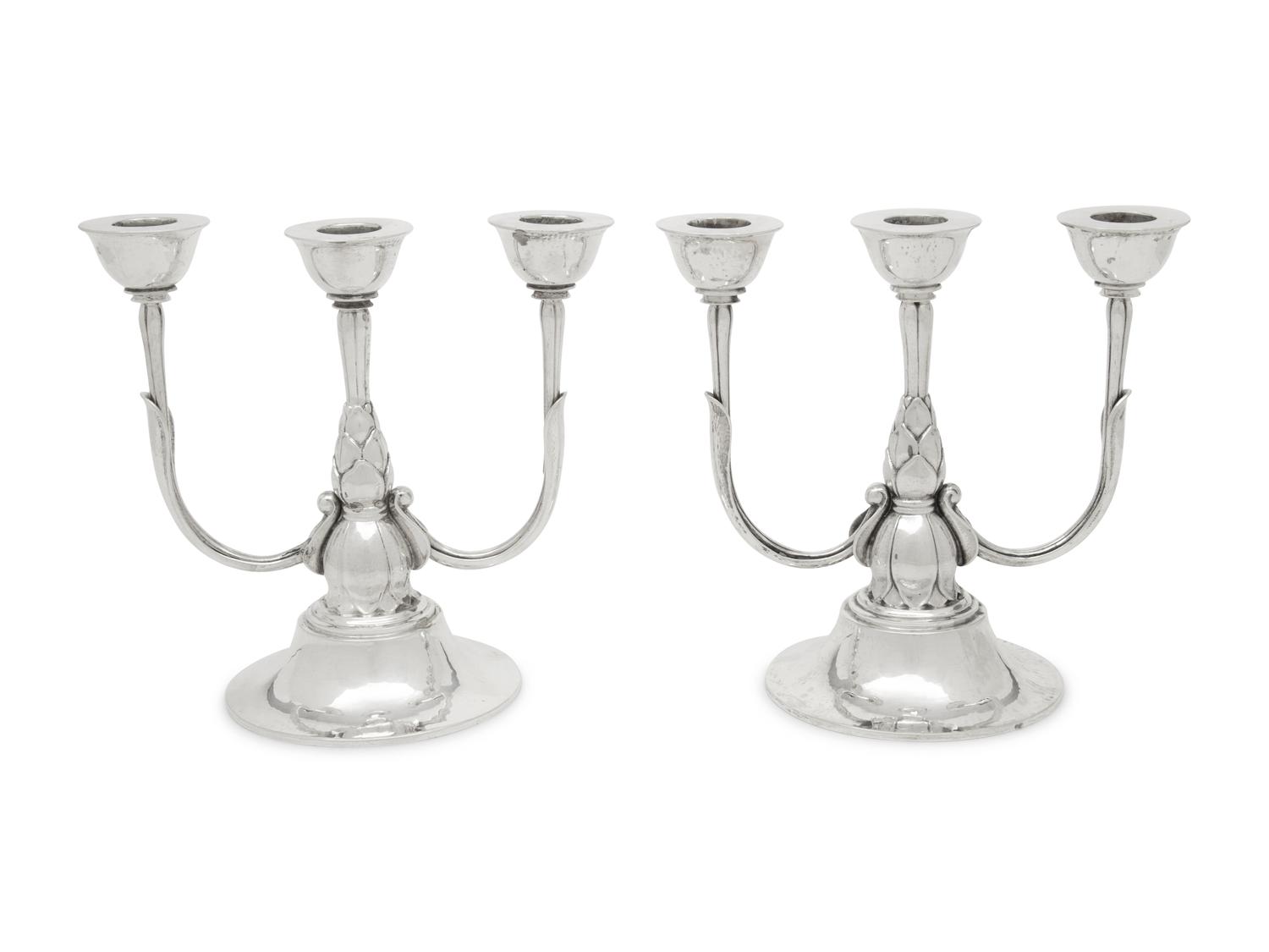 A Pair of Harald Nielsen for Georg Jensen Silver Three-Light Candelabra