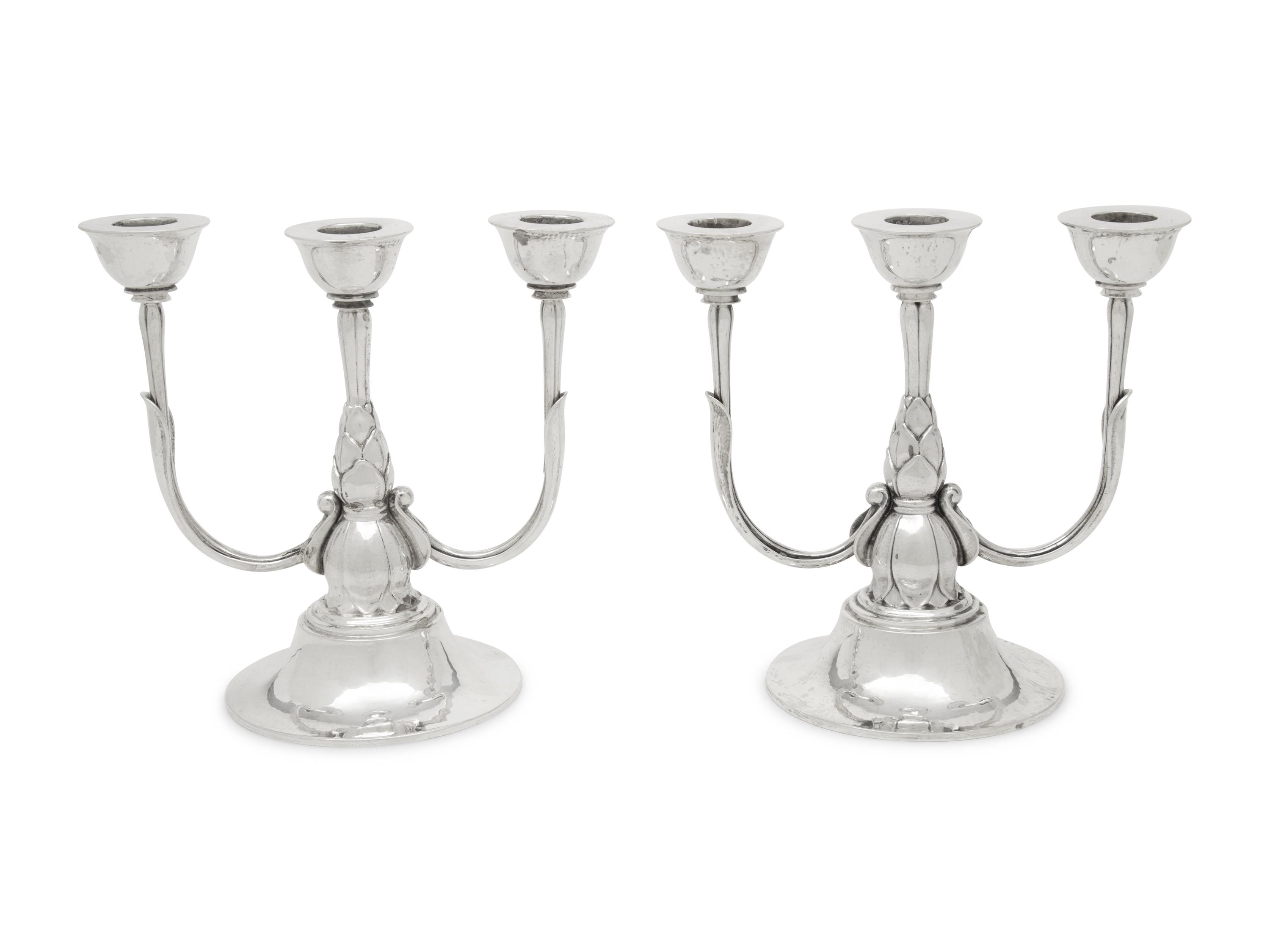 A Pair of Harald Nielsen for Georg Jensen Silver Three-Light Candelabra