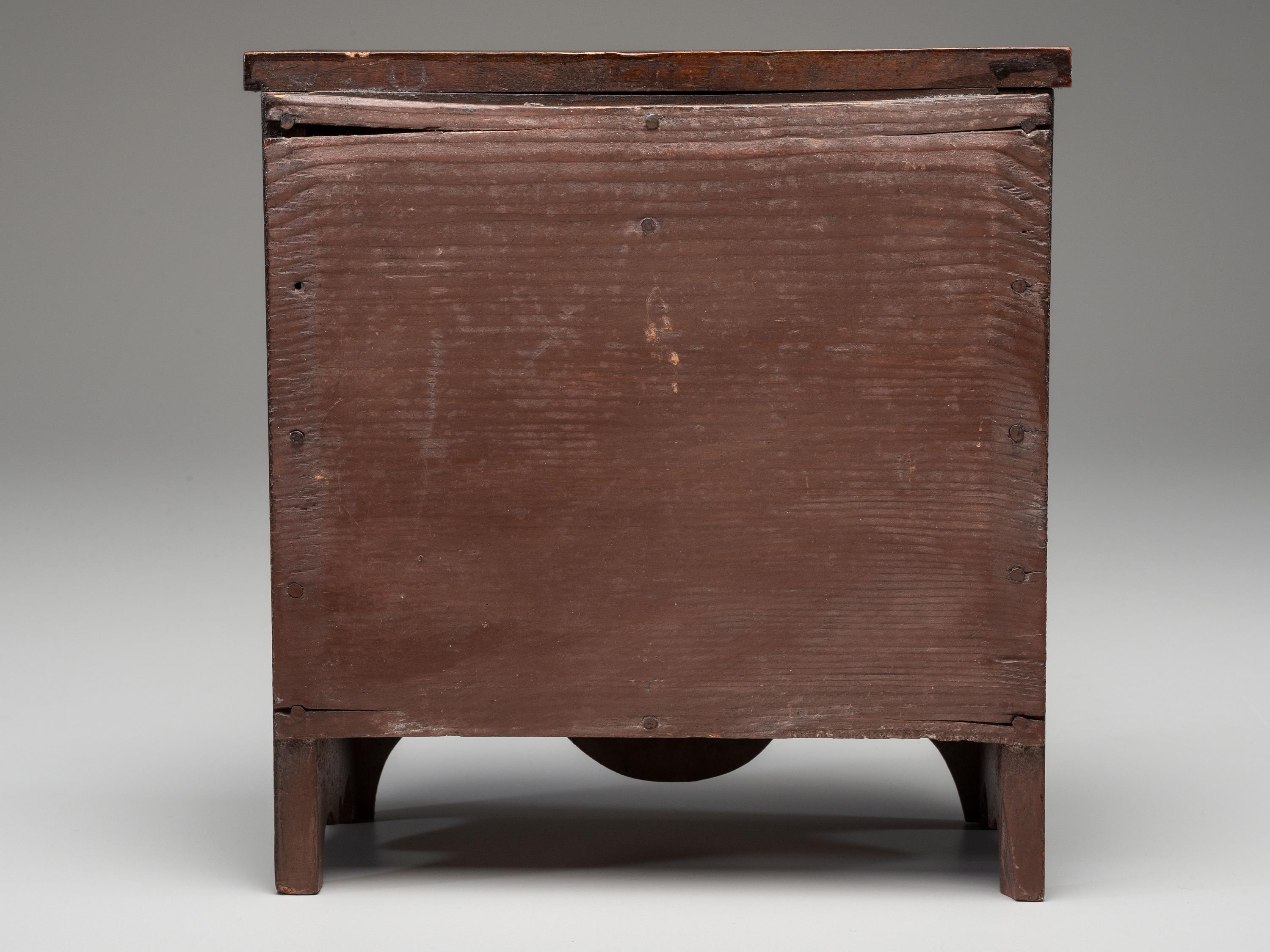 A Diminutive Federal Carved and Painted Poplar and Tiger Maple Chest of Drawers