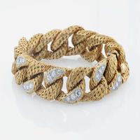 An 18K yellow gold and diamond curb link bracelet, Tiffany & Co. George L'Enfant, Paris