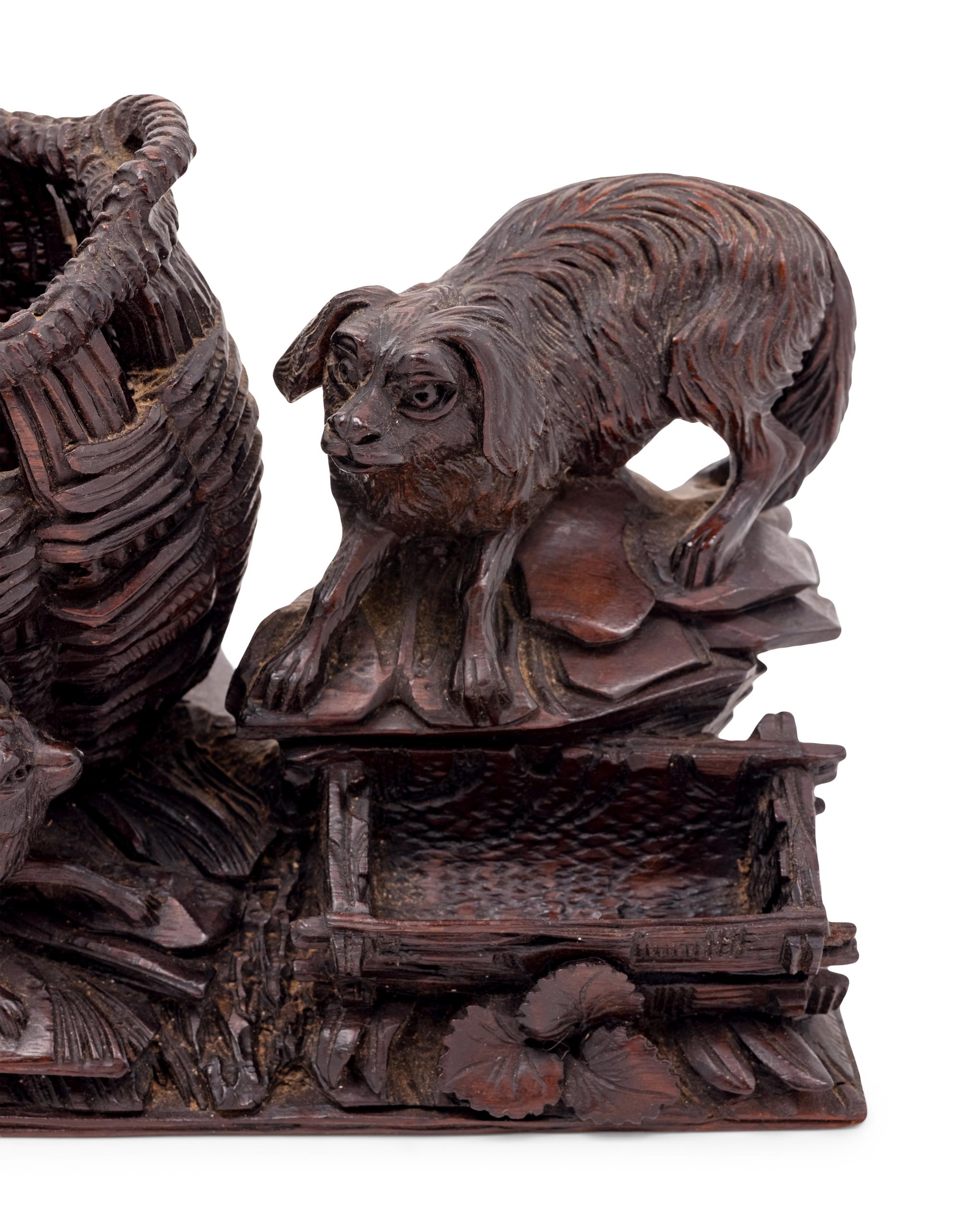 A Black Forest Carved Cigar Humidor