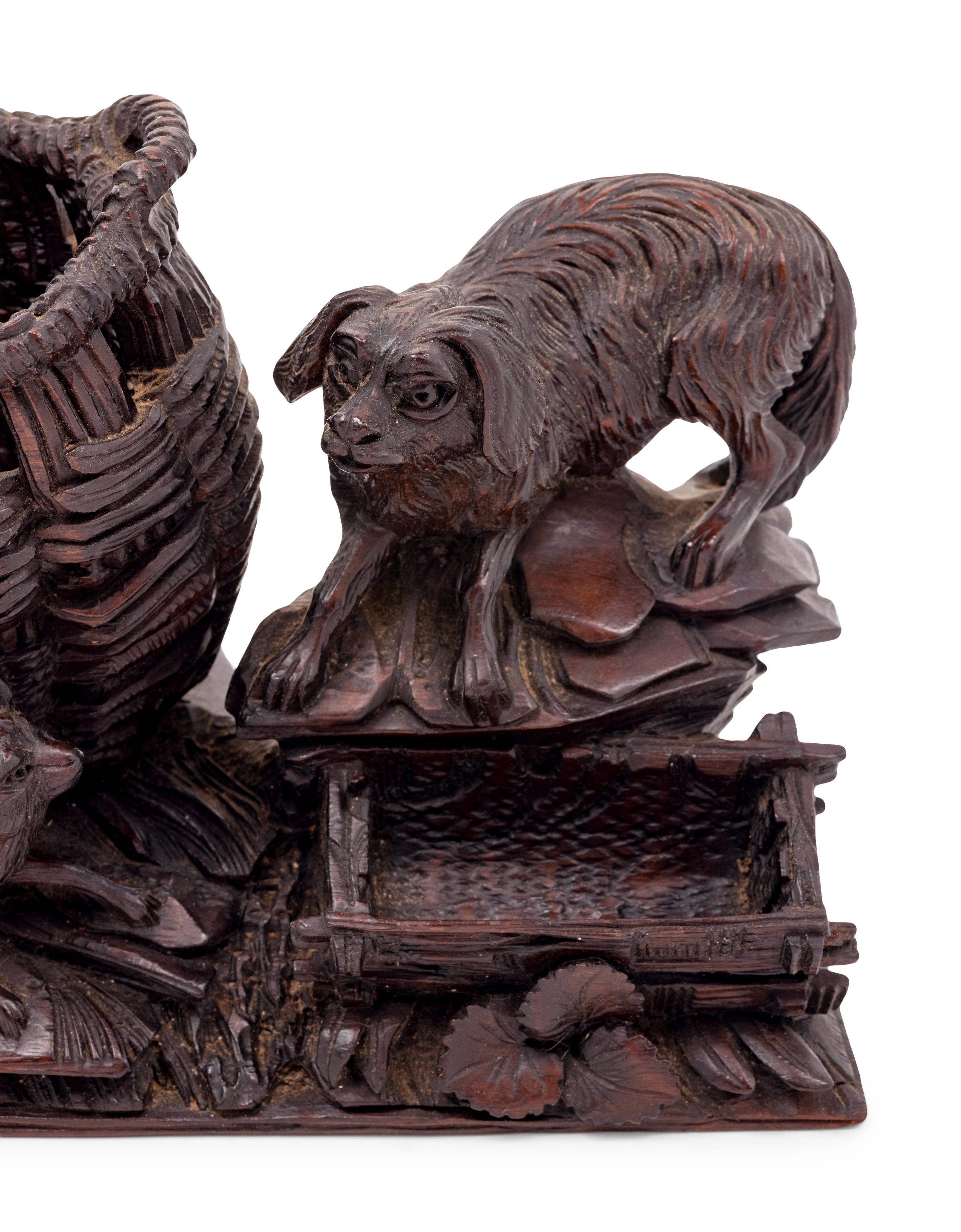 A Black Forest Carved Cigar Humidor