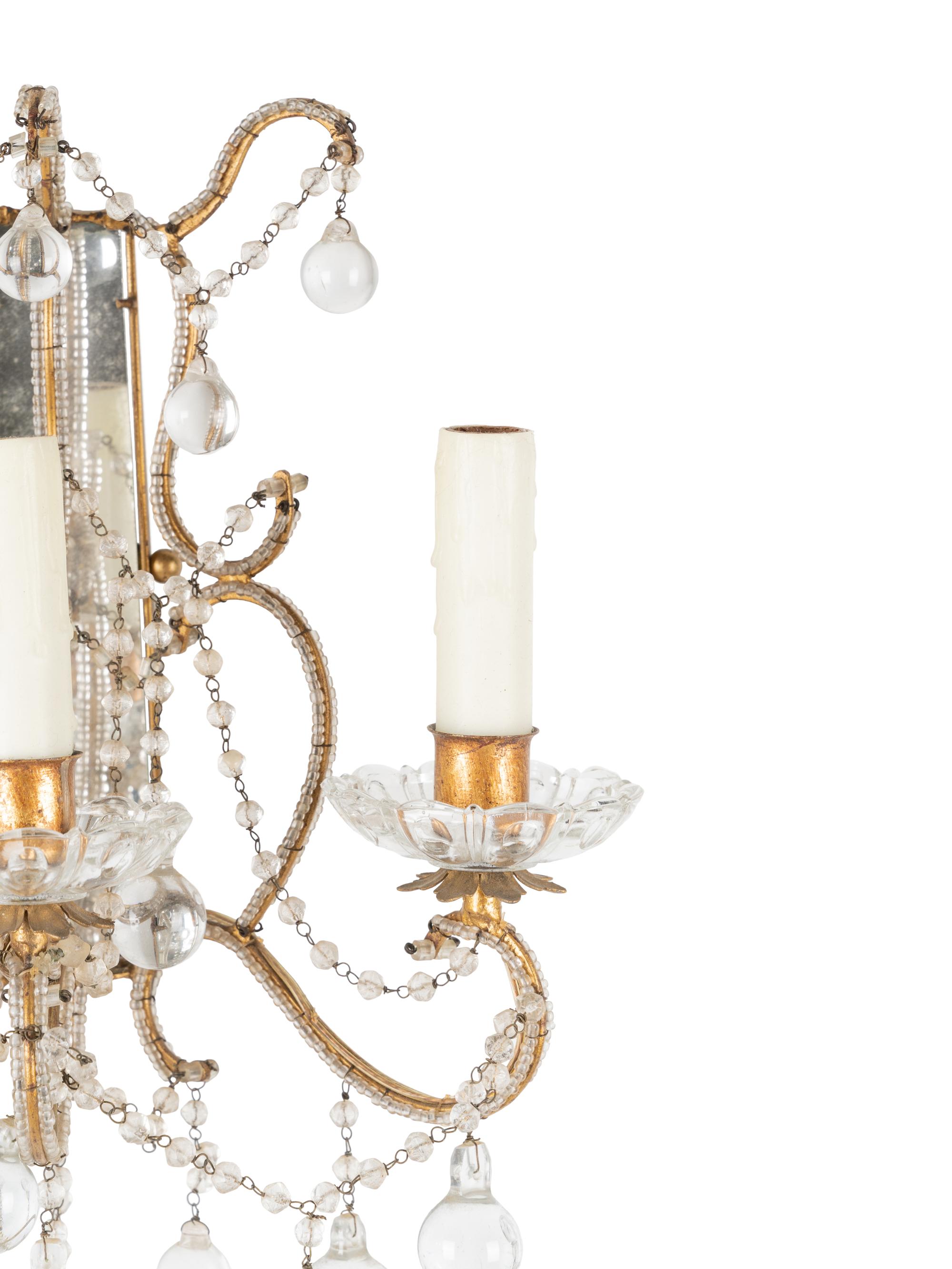 A Pair of Beaded Three-Light Sconces