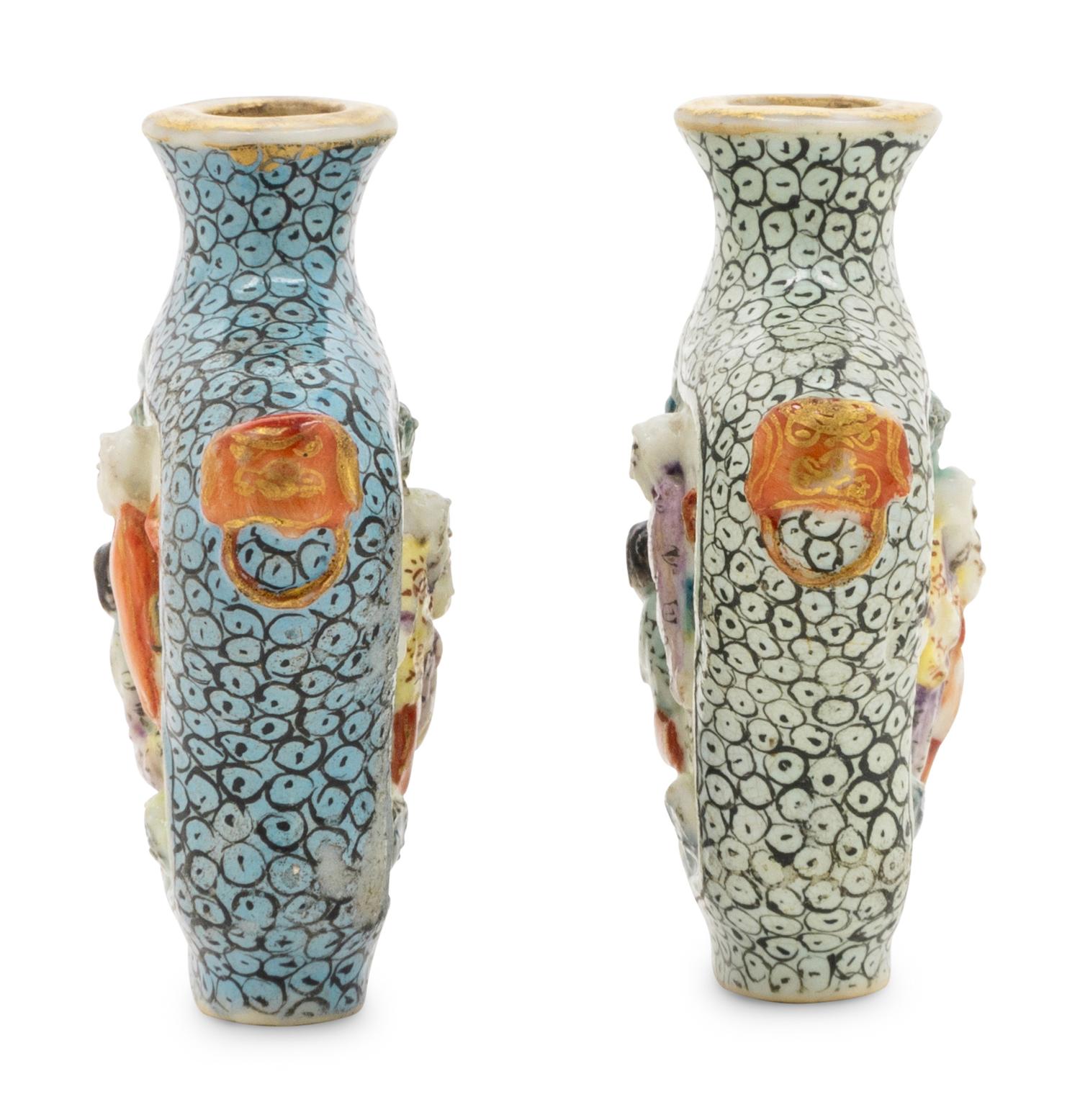 Two Molded Famille Rose Porcelain Snuff Bottles