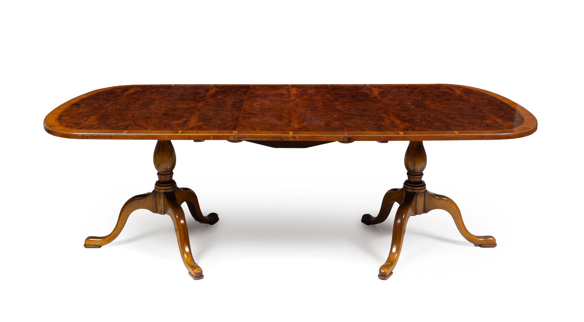 A Provincial George III Style Cross-Banded Burl Walnut Double-Pedestal Dining Table