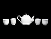 A Set of White Glazed Porcelain Teapot and Tea Cups and A Covered Mug