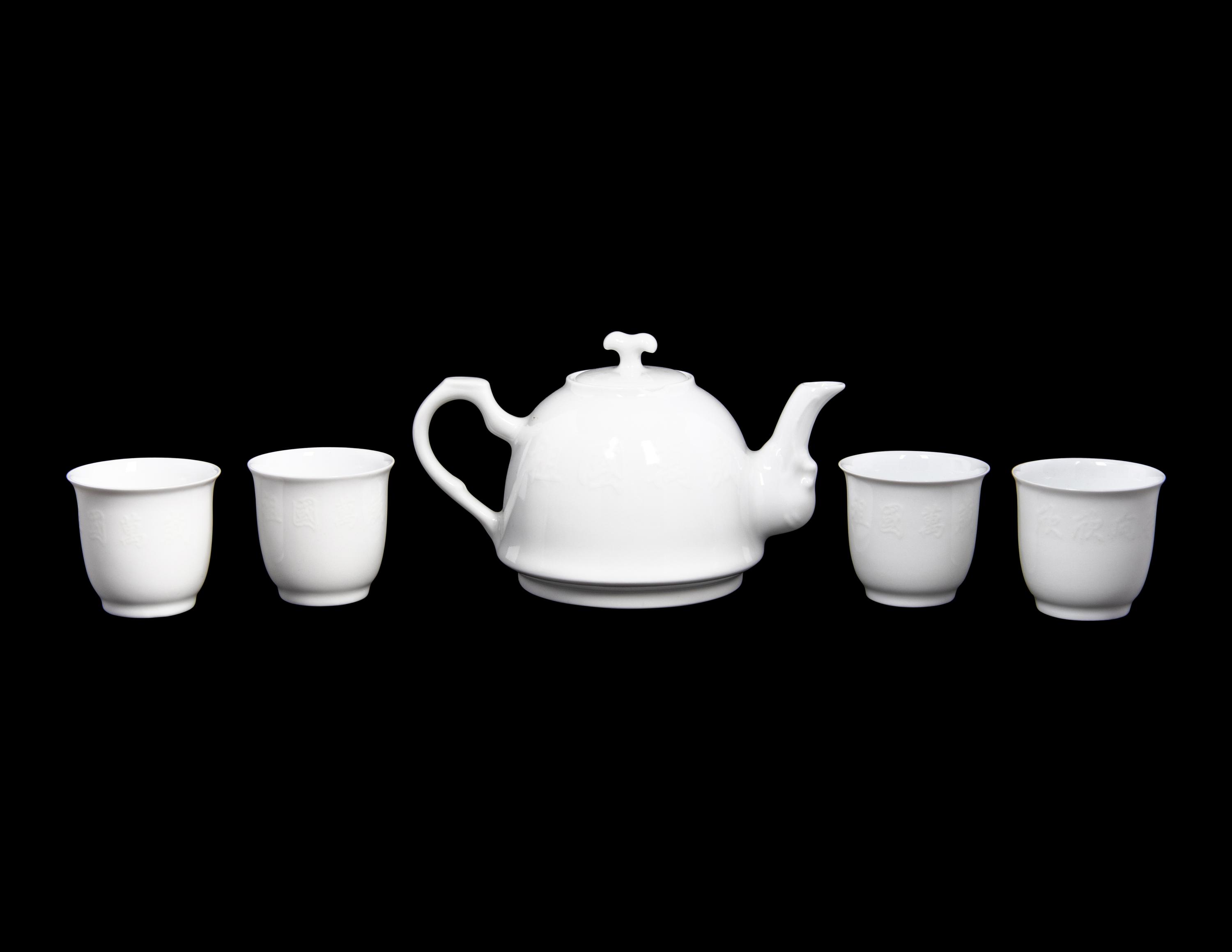 A Set of White Glazed Porcelain Teapot and Tea Cups and A Covered Mug