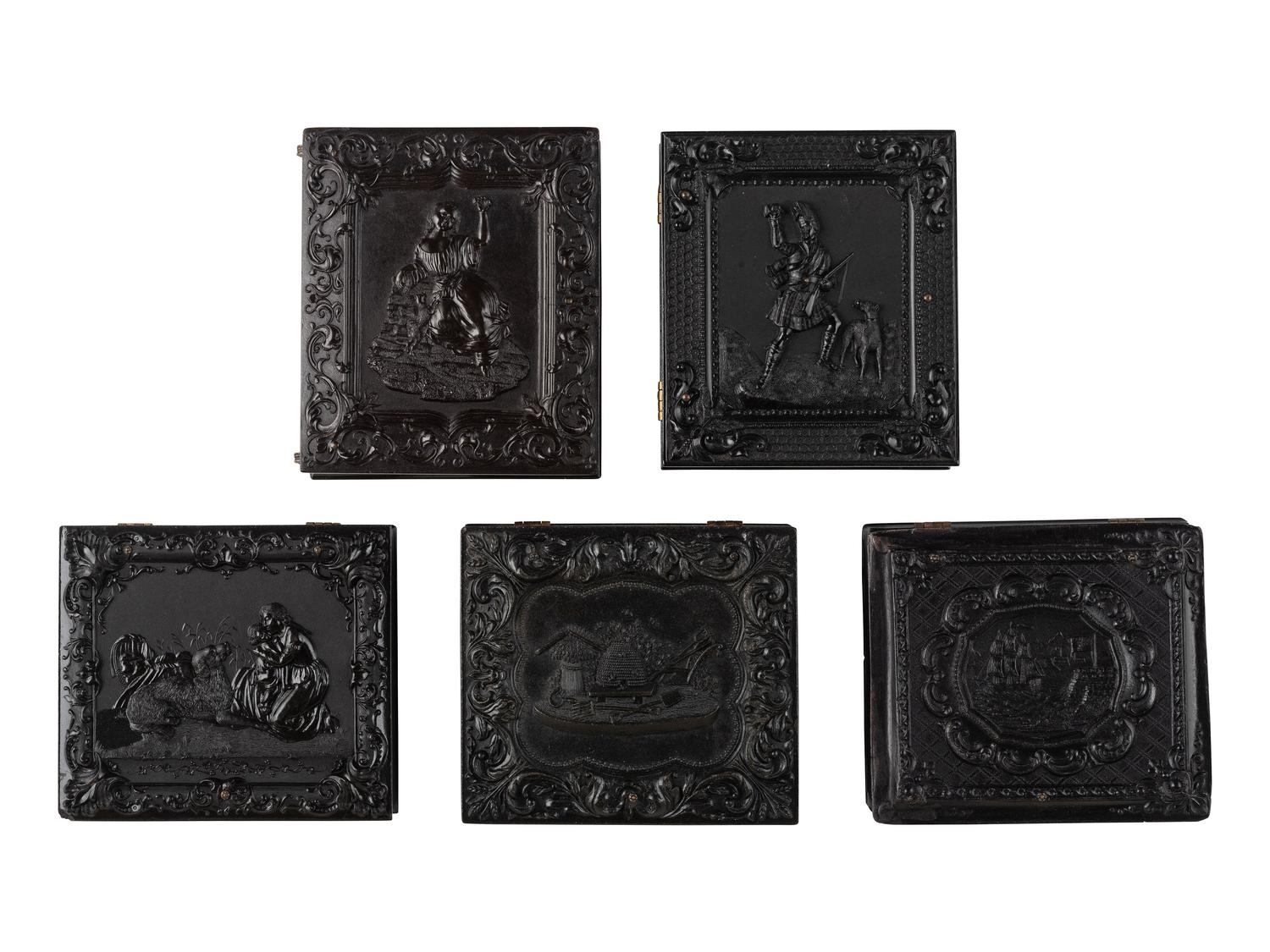 [EARLY PHOTOGRAPHY]. 10 figural and floral sixth plate Union cases containing portraits of men.