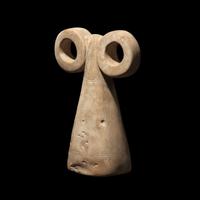 A Mesopotamian Stone Spectacle Idol