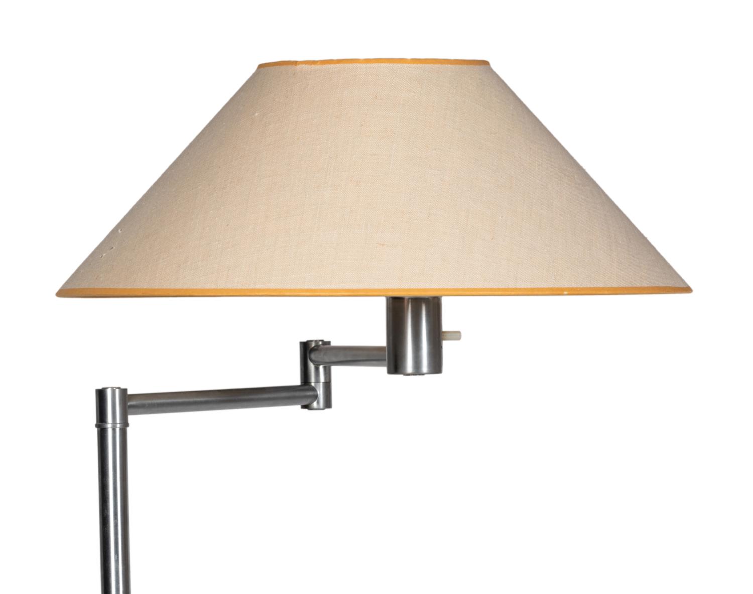 A Group of Walter Von Nessen Floor Lamps and a Desk Lamp