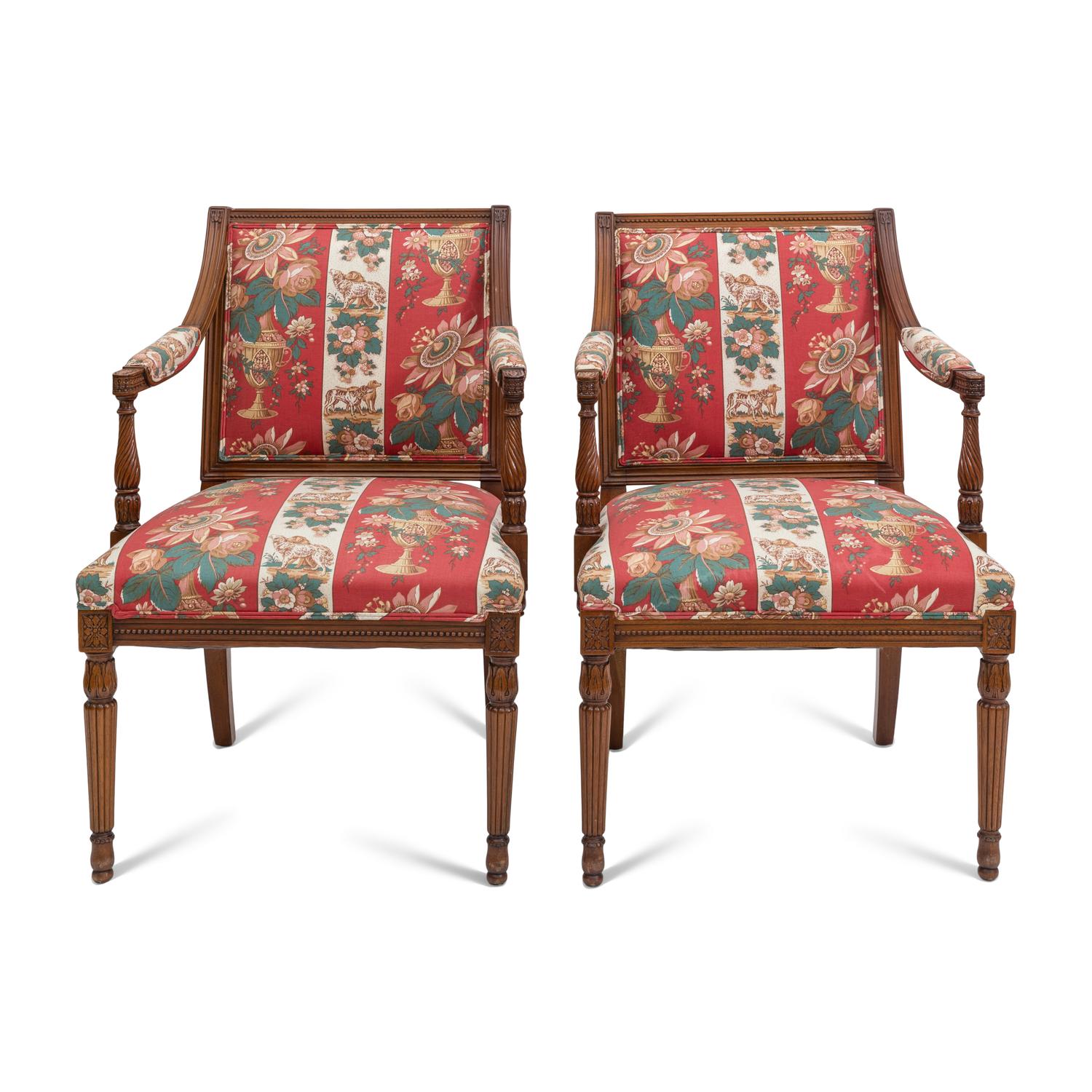 A Pair of Louis XVI Style Fauteuils with Striped Upholstery