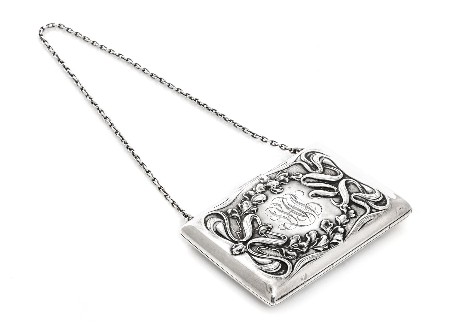 An American Art Nouveau Silver Change Purse, William B. Kerr & Co., Newark, NJ, Early 20th century, the sides decorated with ribbon and