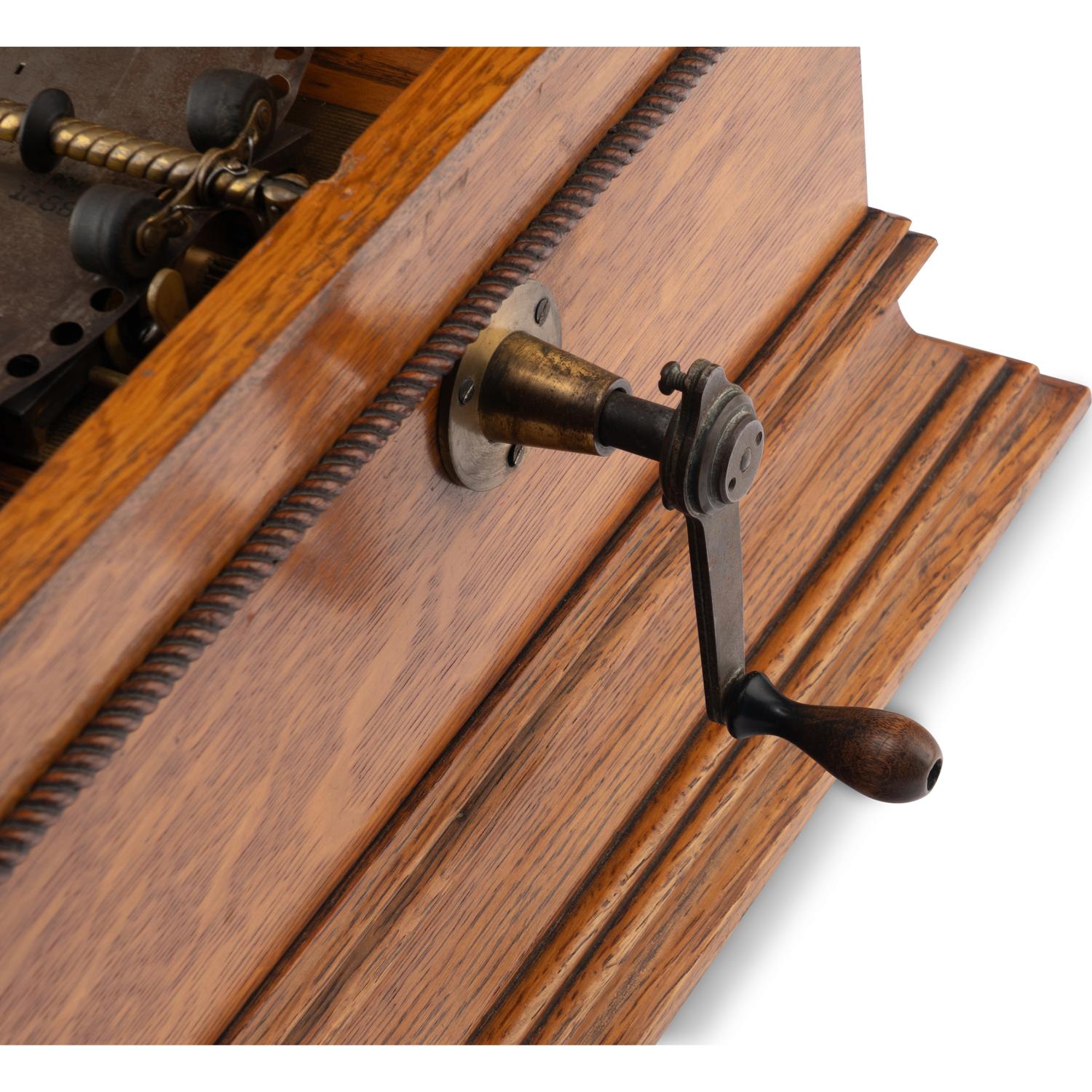 A Regina Oak Tabletop Disc Music Box
