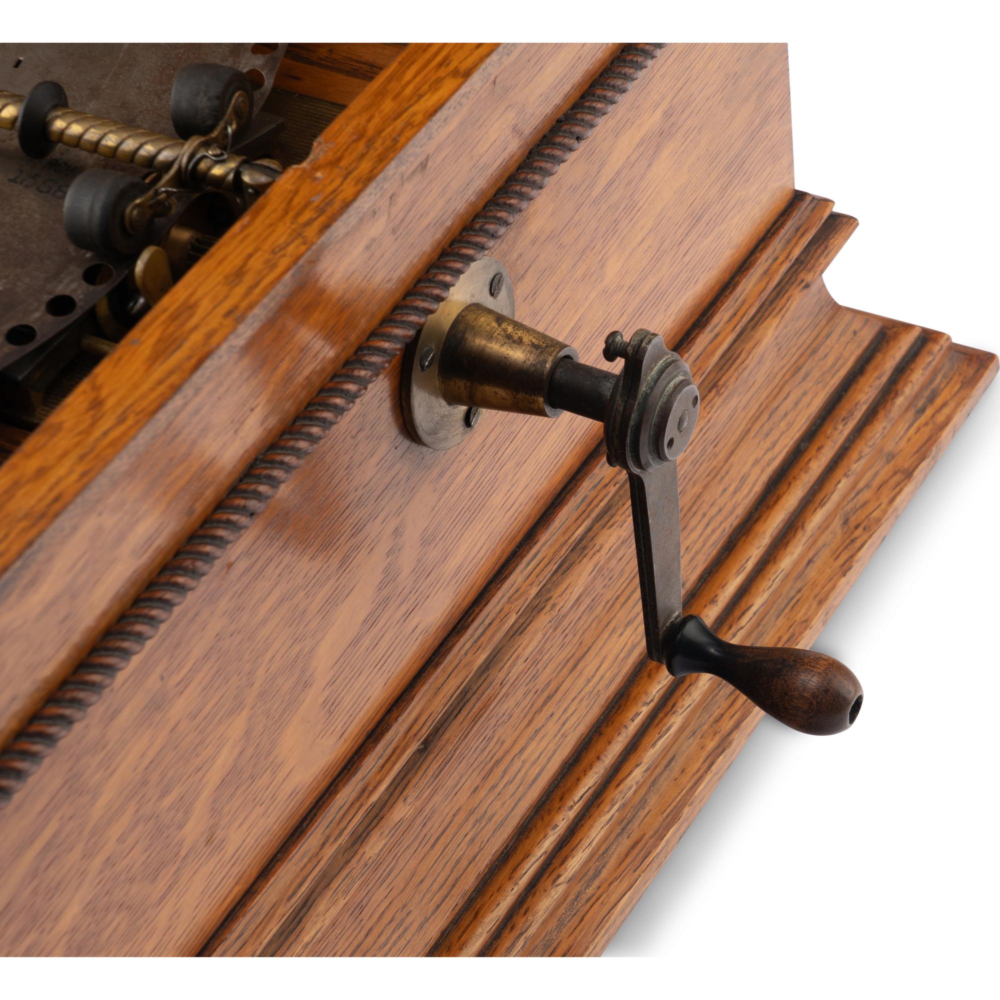 A Regina Oak Tabletop Disc Music Box