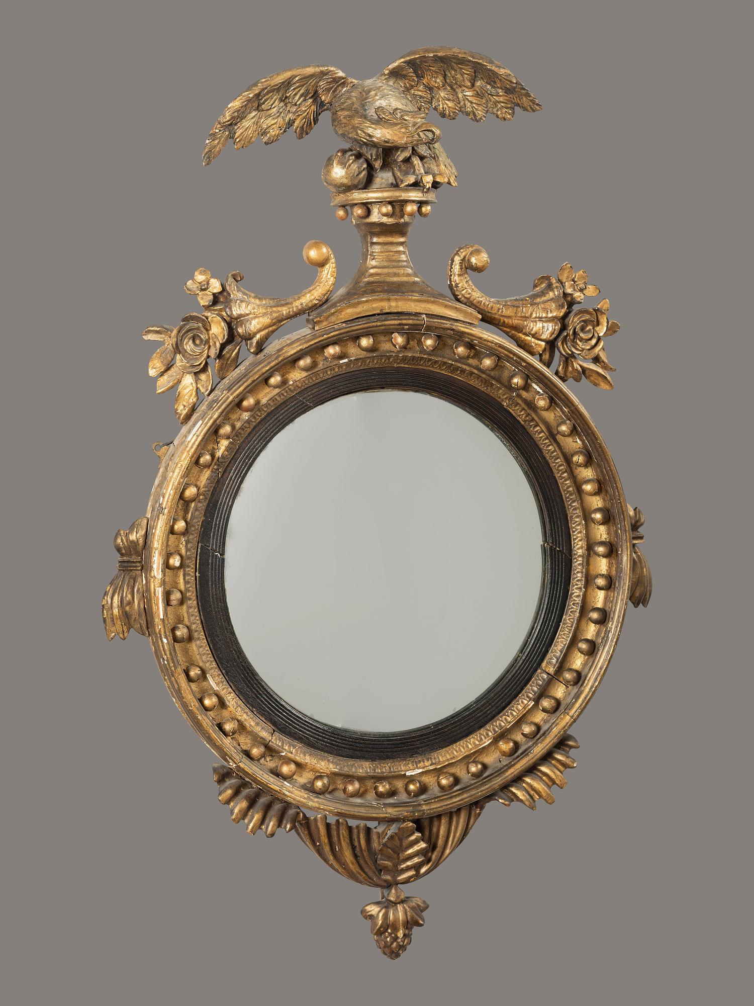 A Federal Giltwood Bull's Eye Looking Glass