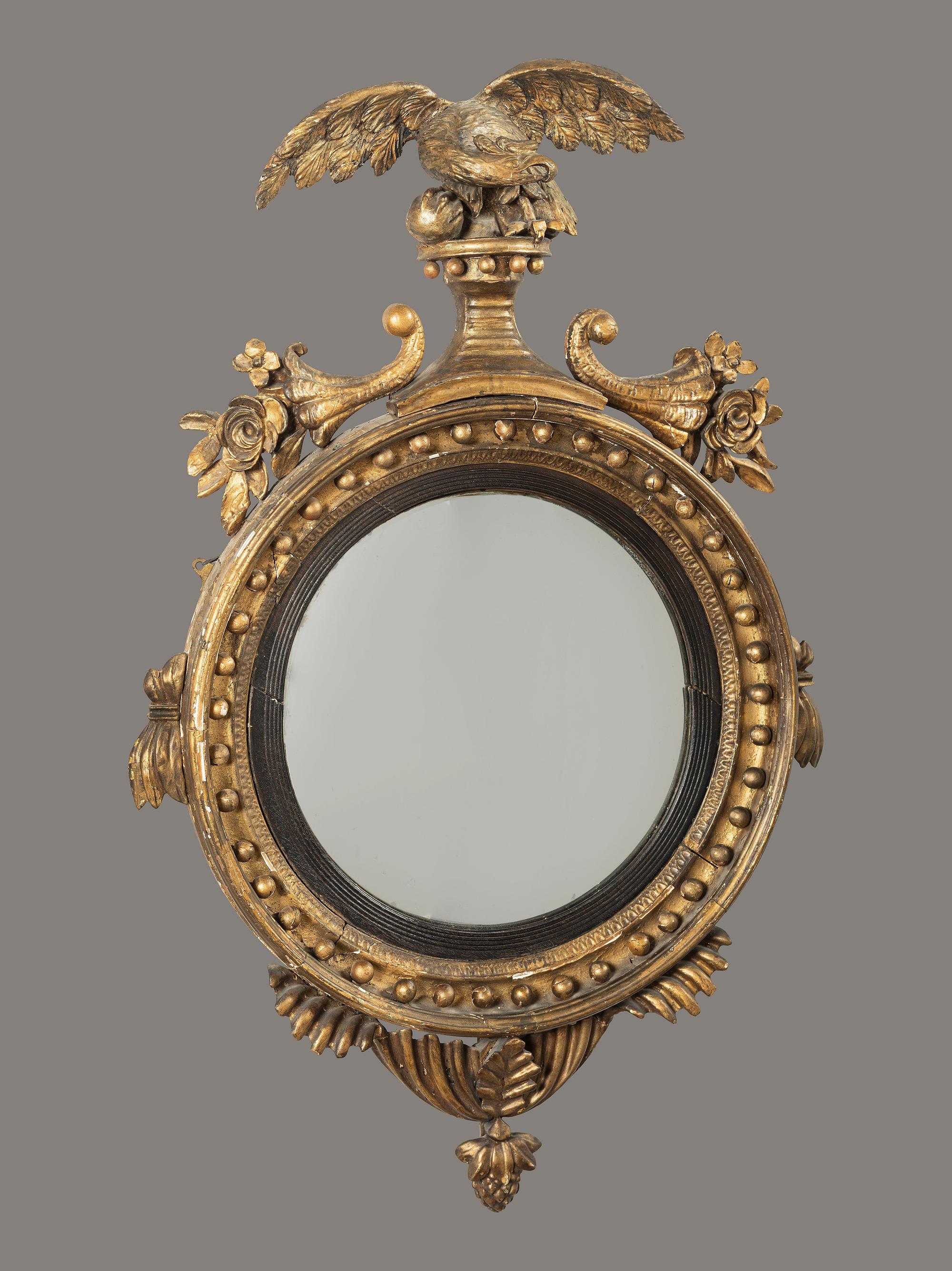 A Federal Giltwood Bull's Eye Looking Glass