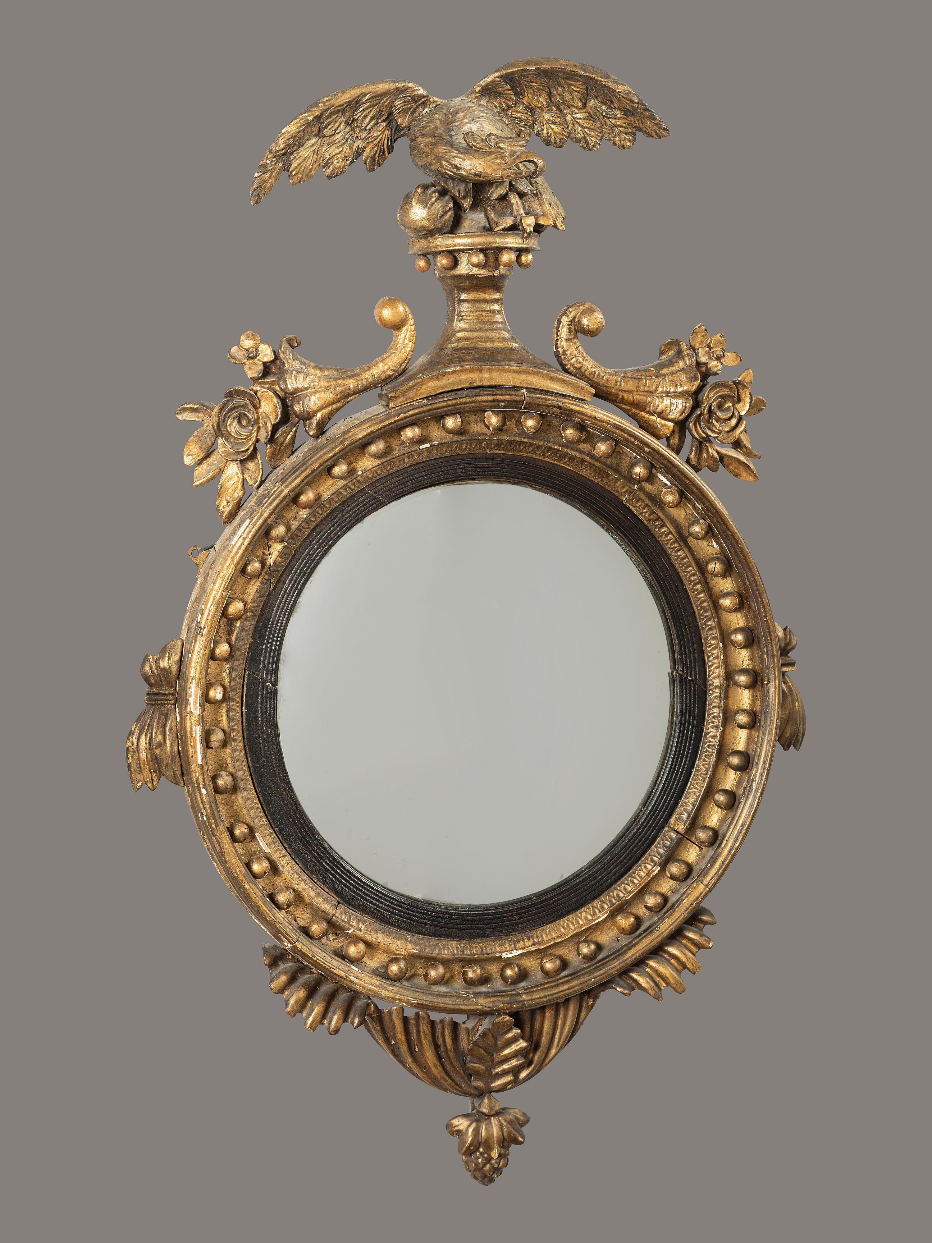 A Federal Giltwood Bull's Eye Looking Glass
