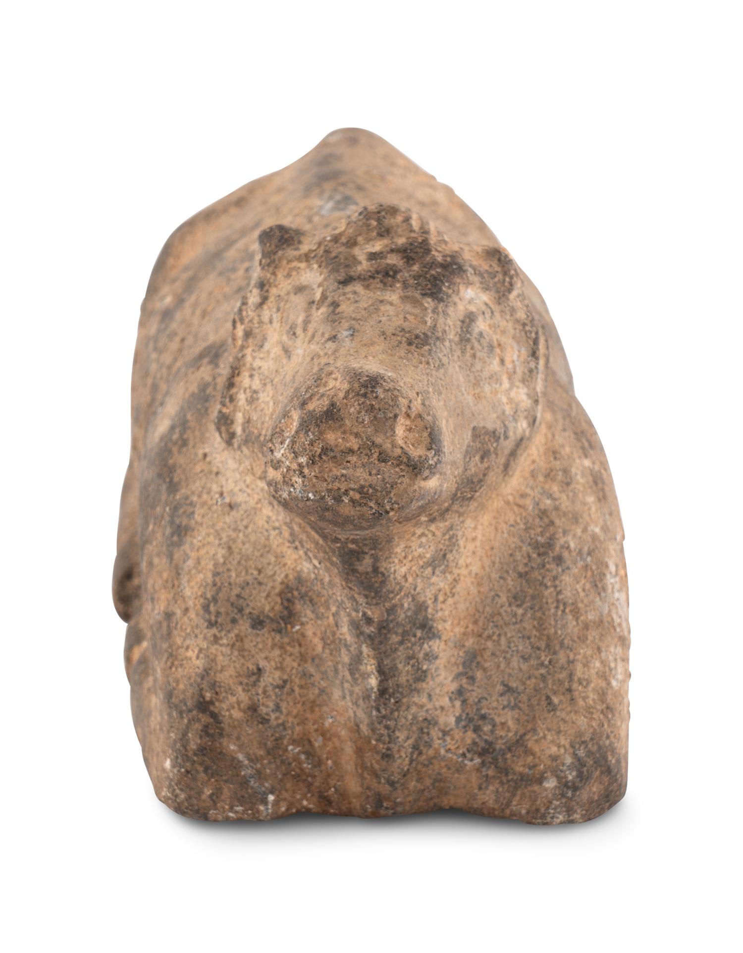 A Syro-Hittite Stone Figure of a Recumbent Bull