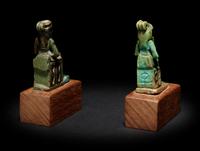 An Egyptian Faience Isis and Horus and an Egyptian Faience Sekhmet