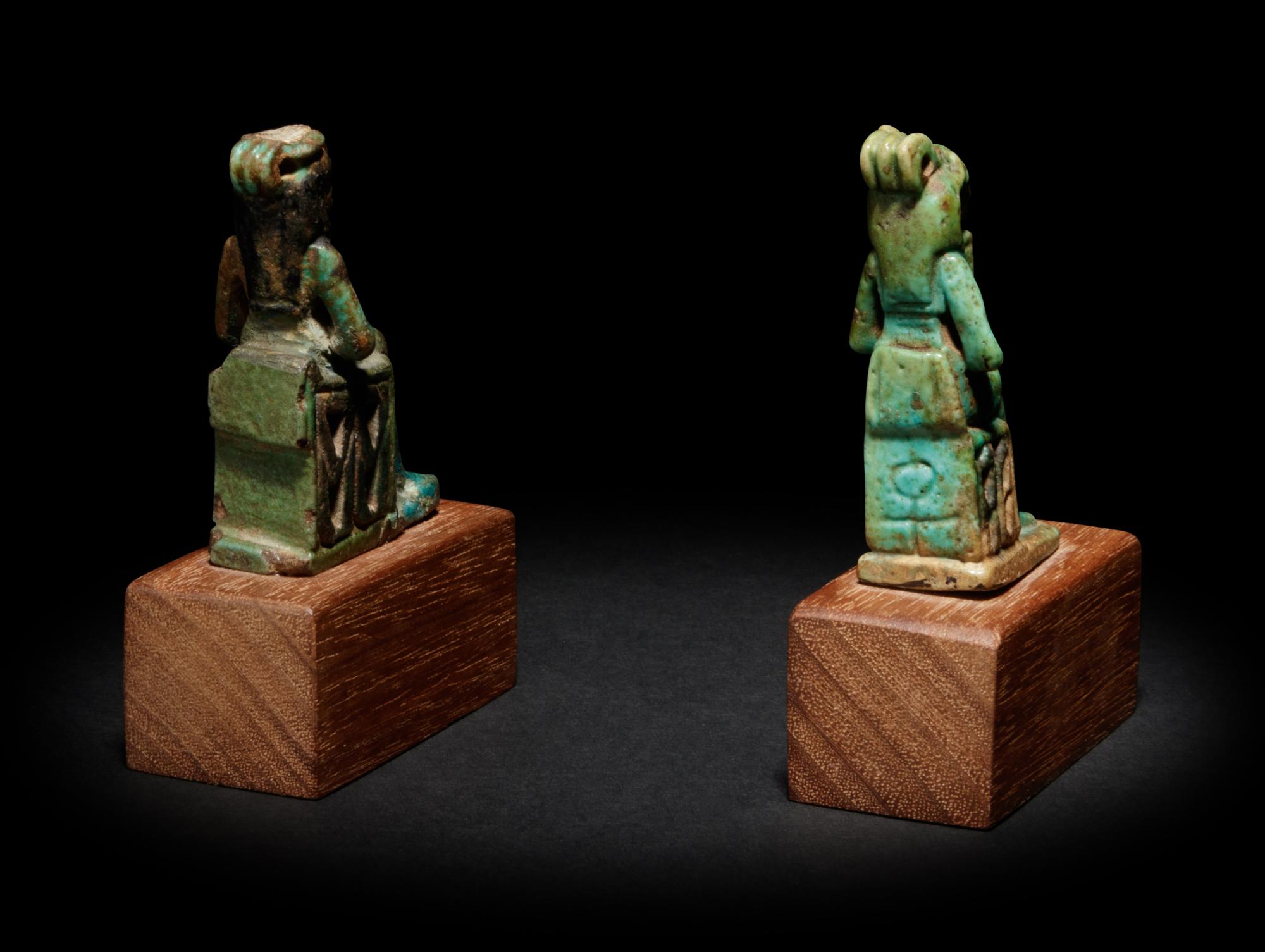 An Egyptian Faience Isis and Horus and an Egyptian Faience Sekhmet