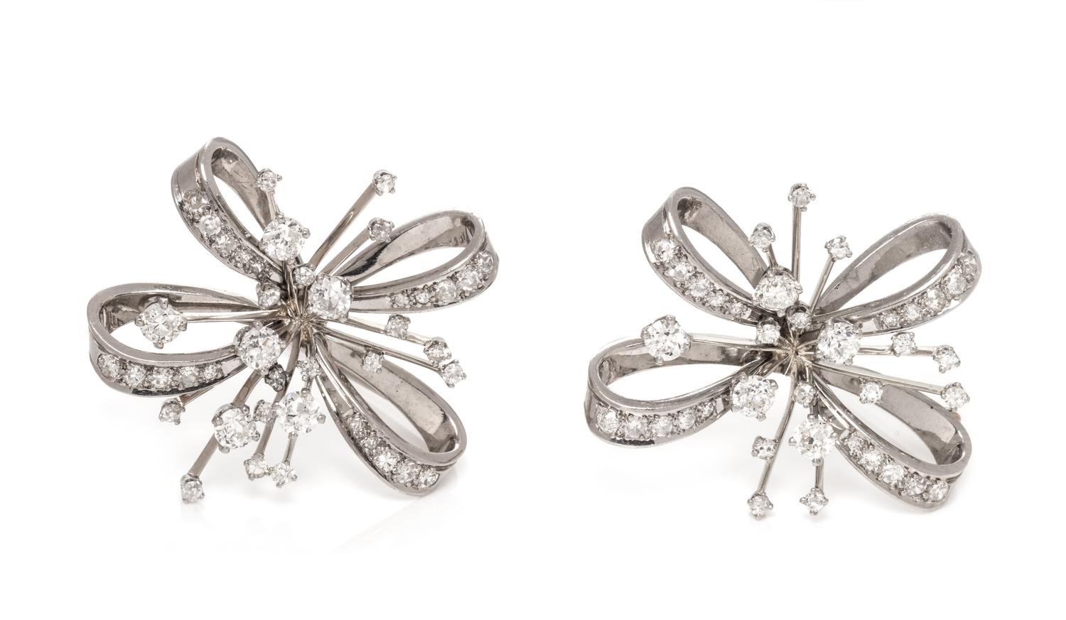 A Pair of 18 Karat White Gold and Diamond Brooches, Trabert-Hoeffer & Mauboussin,