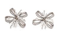 A Pair of 18 Karat White Gold and Diamond Brooches, Trabert-Hoeffer & Mauboussin,