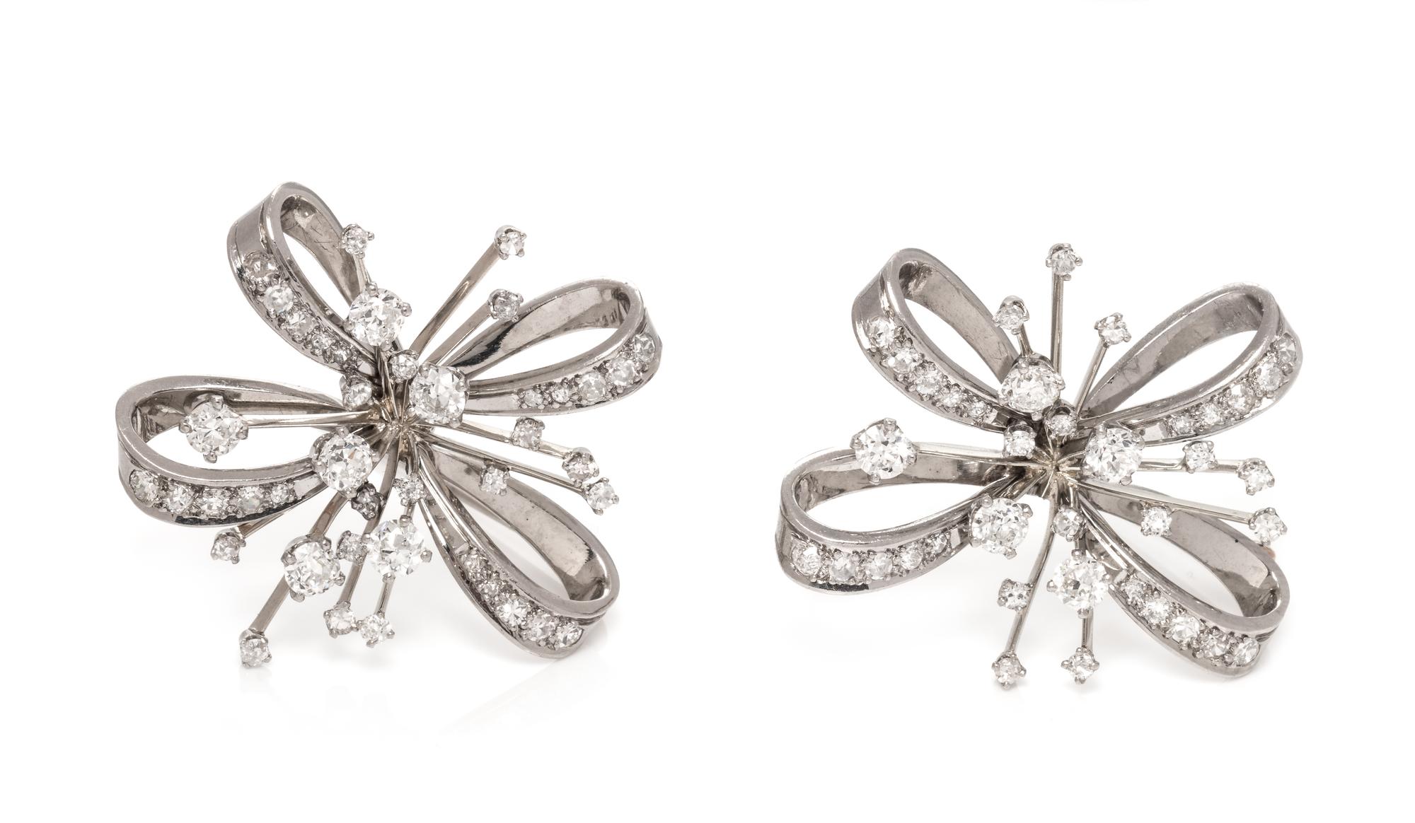 A Pair of 18 Karat White Gold and Diamond Brooches, Trabert-Hoeffer & Mauboussin,