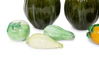 A Collection of Fifteen Miscellaneous Glazed Ceramic Fruits and Vegetables