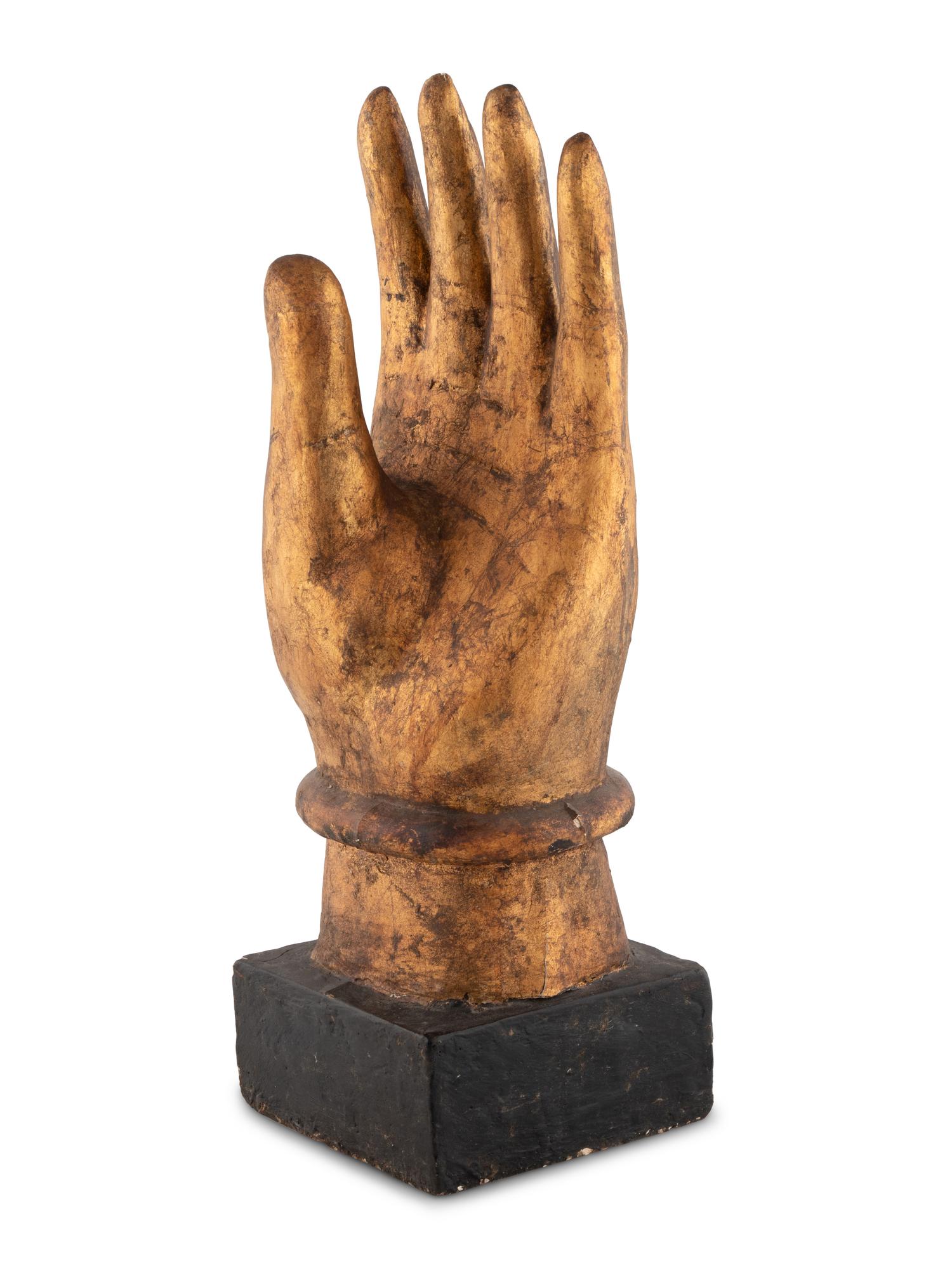 A Folk Art Carved Hand