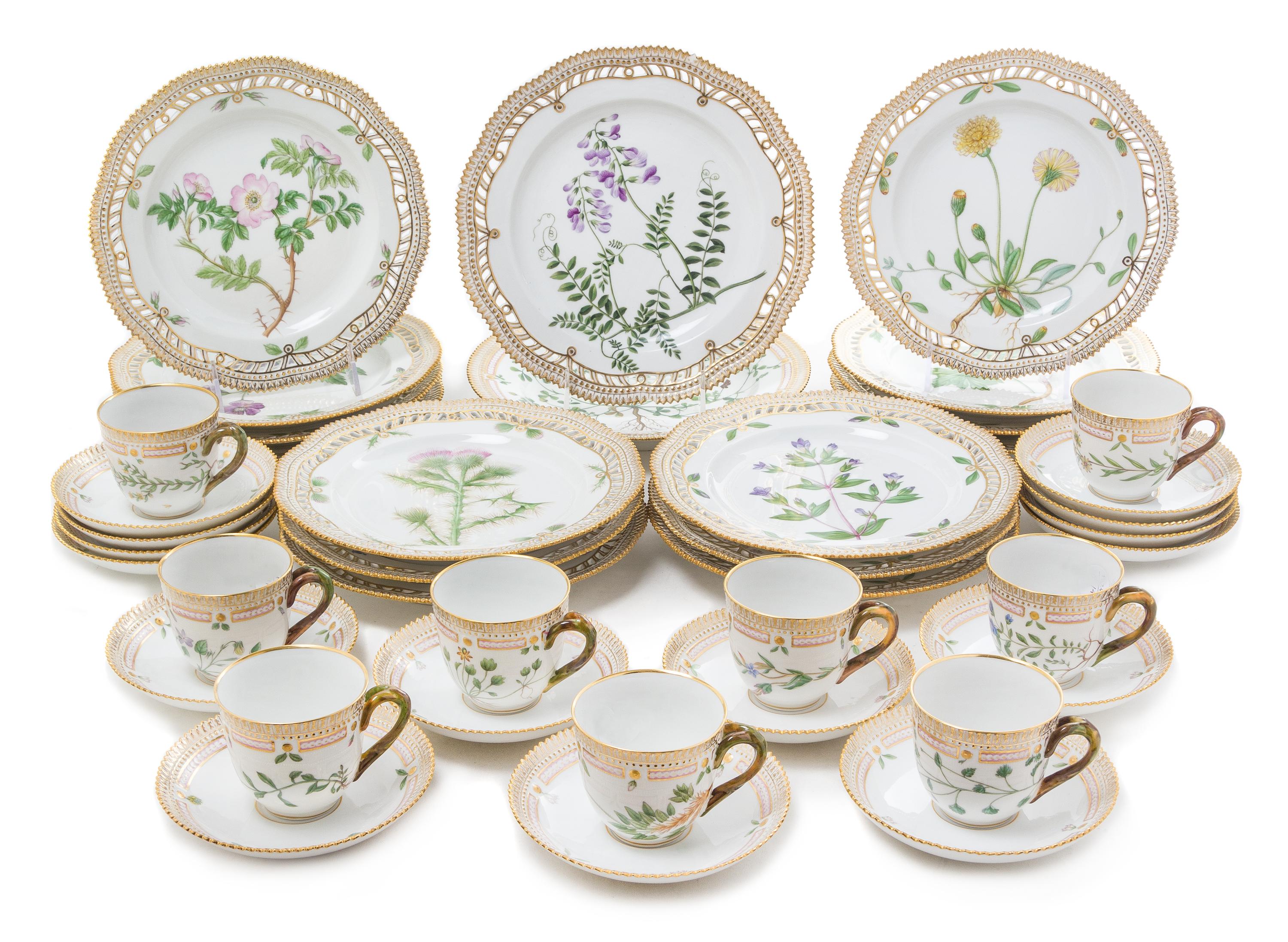 A Royal Copenhagen Porcelain Flora Danica Partial Dinner Service Diameter of dinner plate 9 7/8 inches. — 20TH CENTURY
