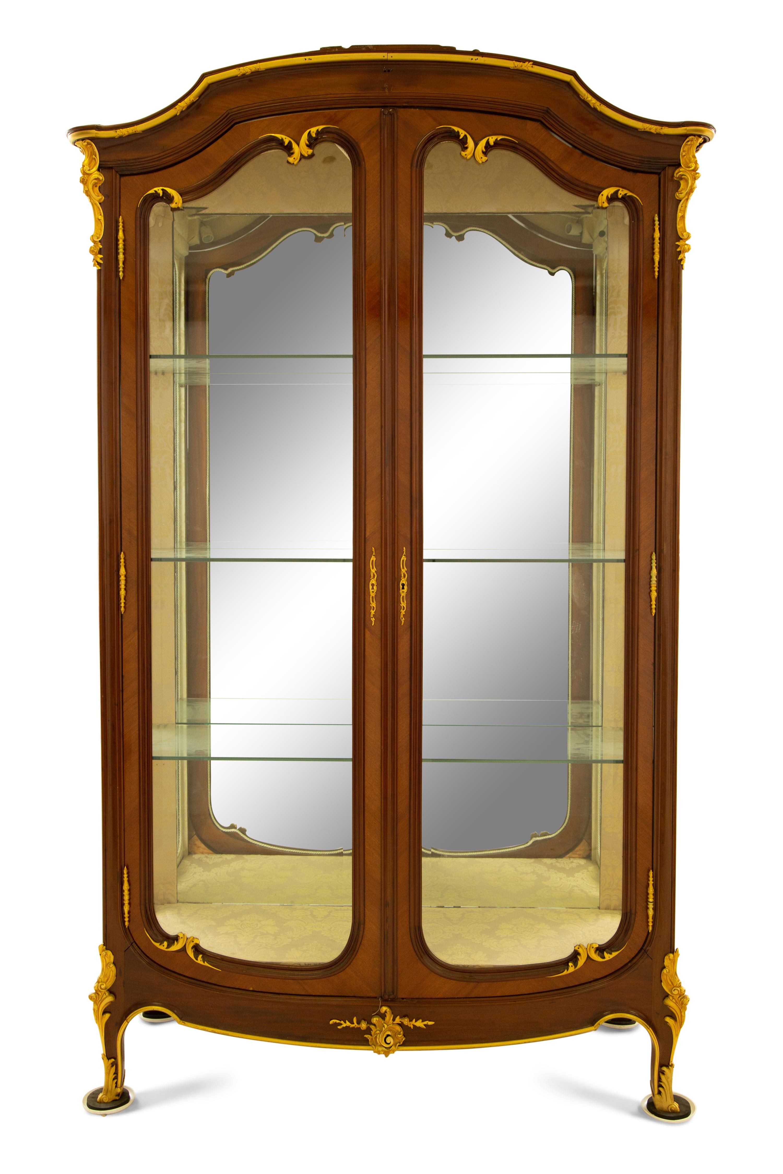 A Louis XV Style Gilt Bronze Mounted Mahogany Vitrine Cabinet