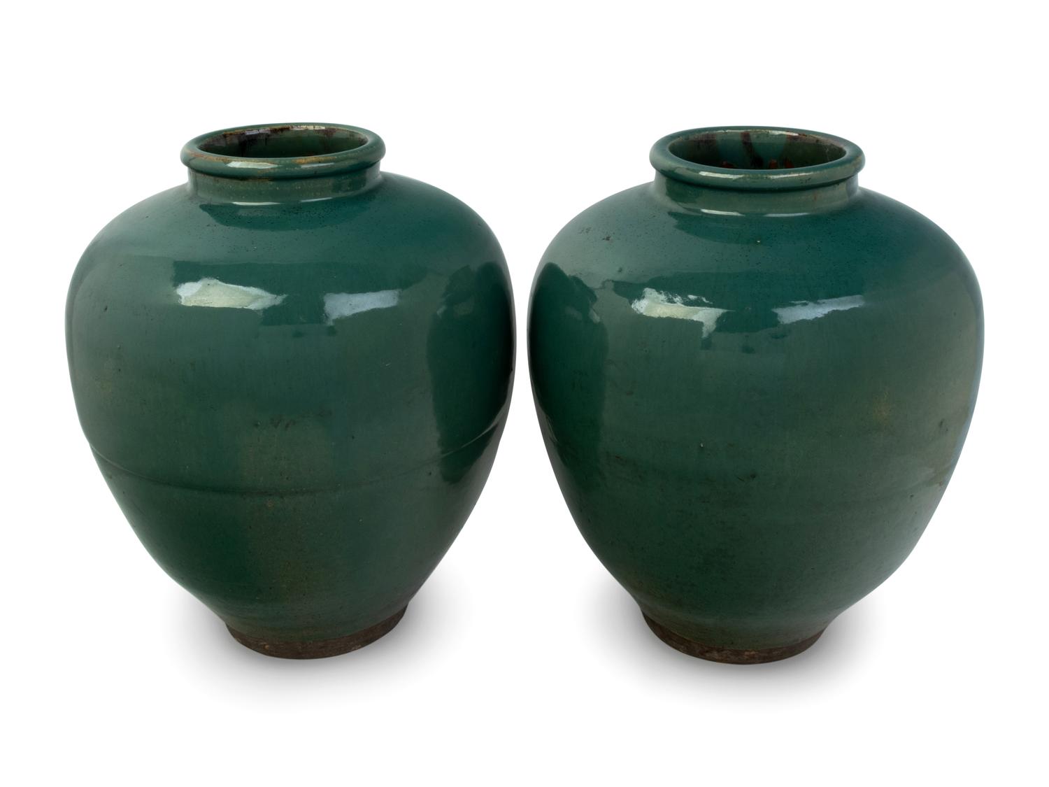A Pair of Green Glazed Porcelain Vases