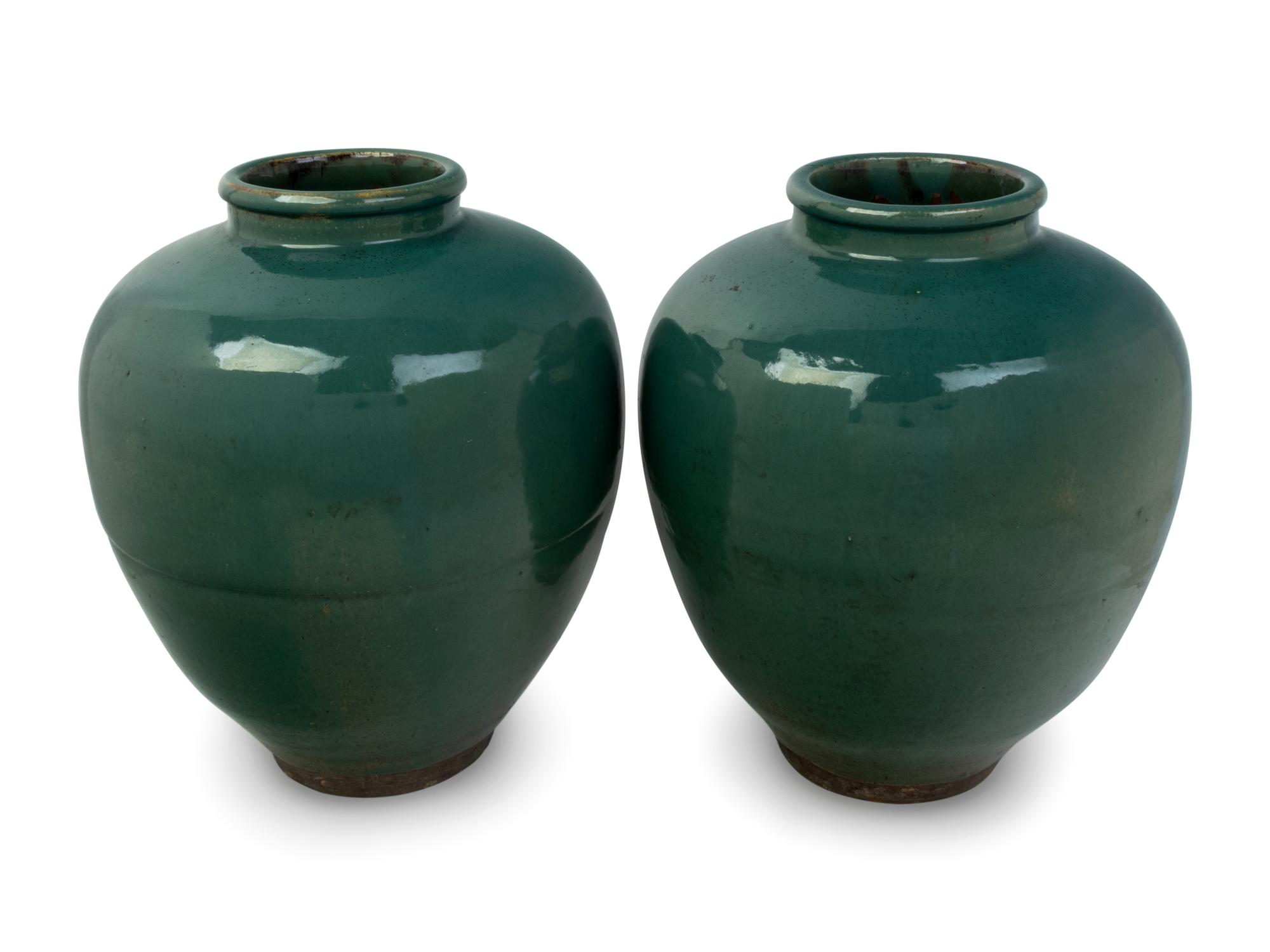 A Pair of Green Glazed Porcelain Vases