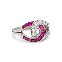GUMBINER, DIAMOND AND RUBY HORSESHOE RING