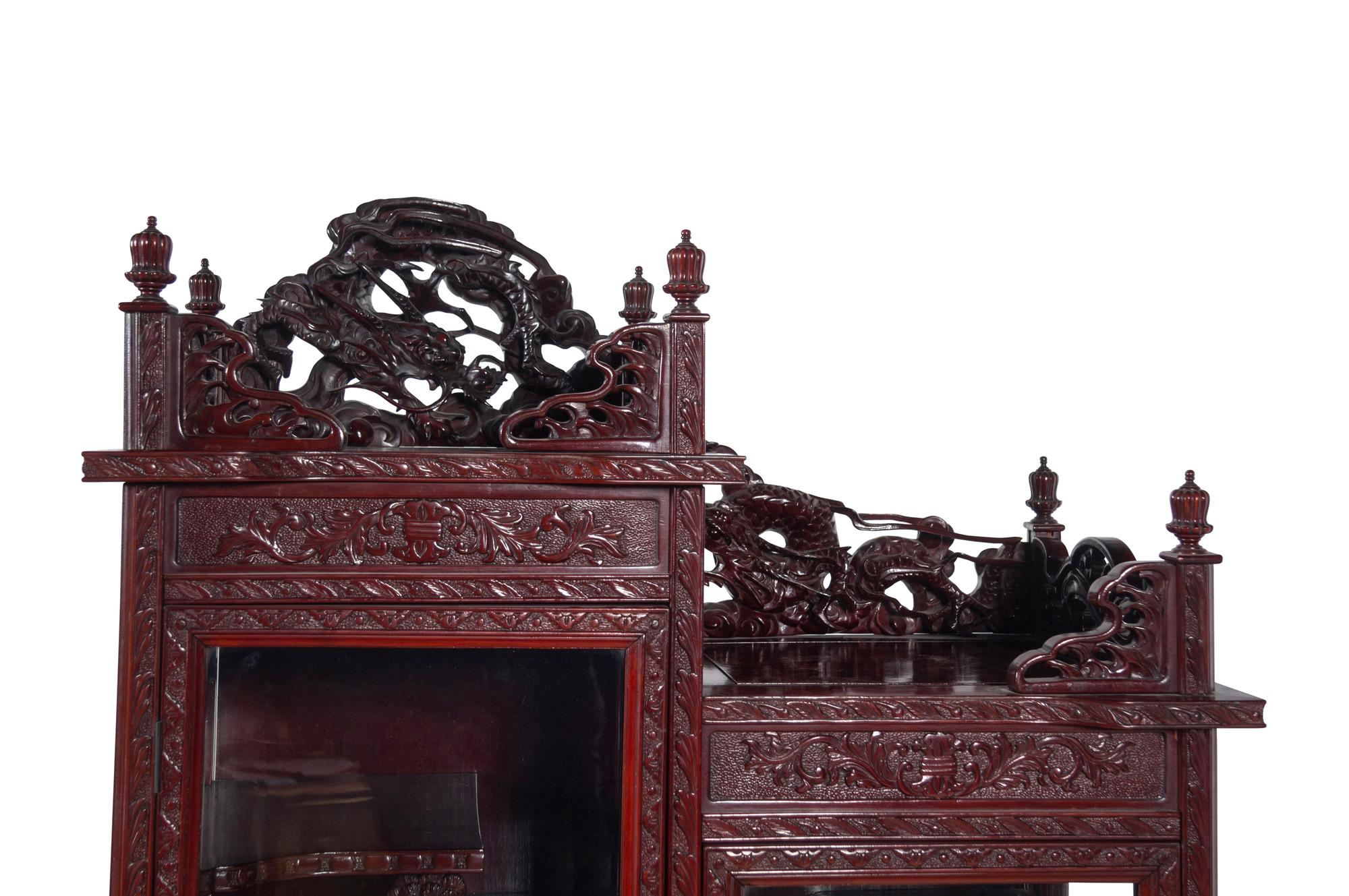 A Japanese Export Carved Hardwood Displaying Cabinet