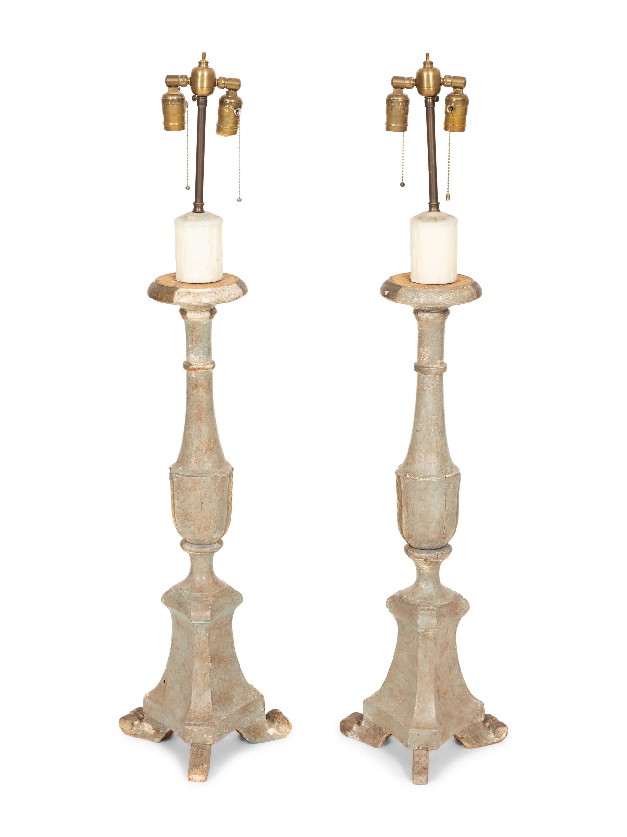 A Pair of Italian Green Painted and Parcel Gilt Pricket Sticks Now Mounted as Lamps