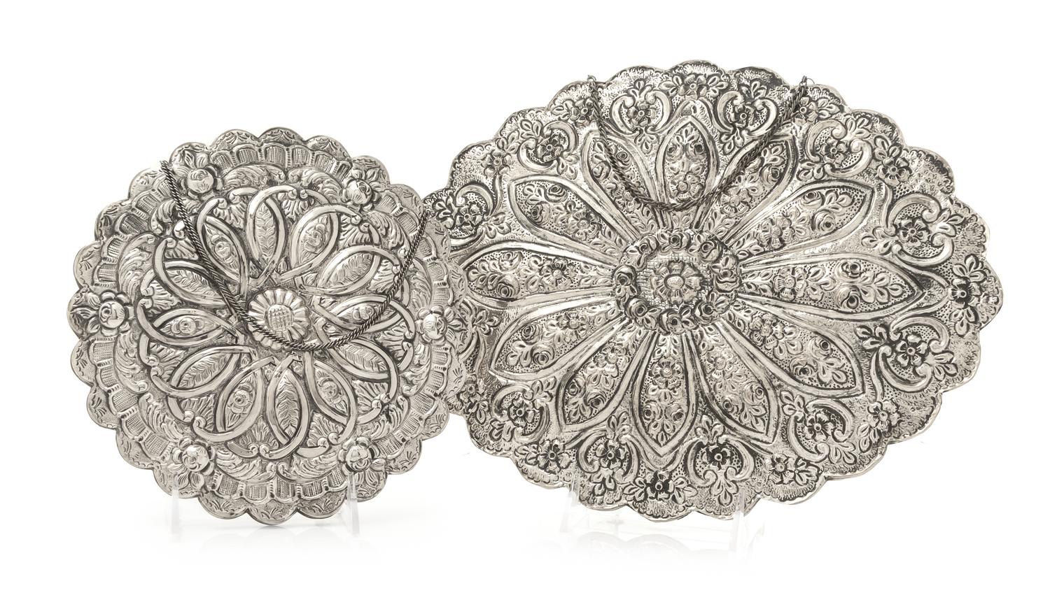 Two Ottoman Empire Style Turkish Silver Mirrors, Bedo, 20th Century, comprising an oval and a circular example, each having a scalloped