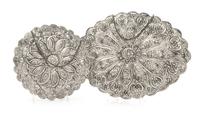 Two Ottoman Empire Style Turkish Silver Mirrors, Bedo, 20th Century, comprising an oval and a circular example, each having a scalloped
