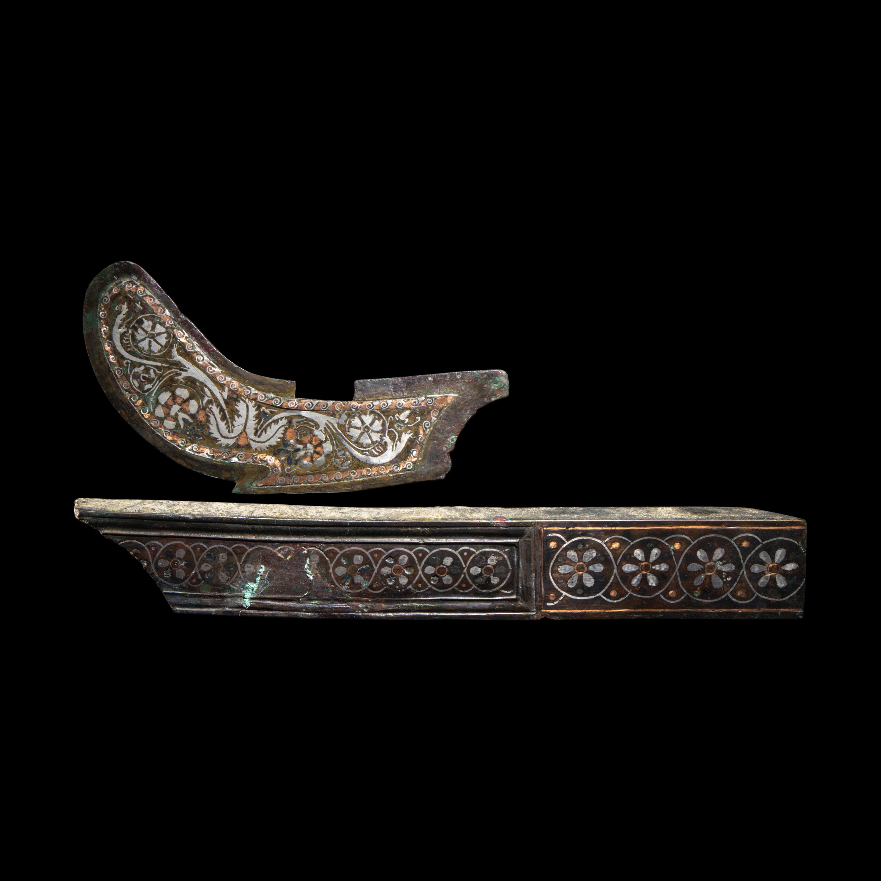 Two Roman Bronze and Enamel Furniture Inlays