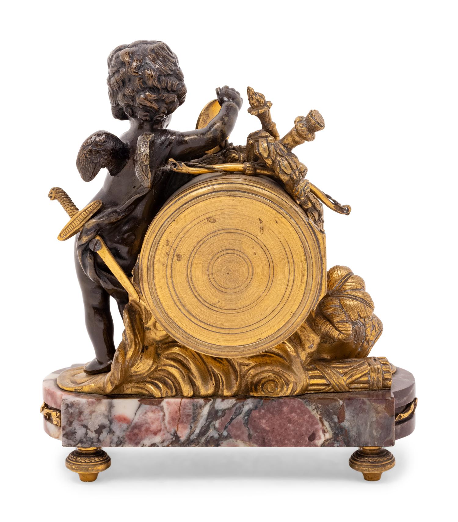 A Louis XV Style Gilt and Patinated Bronze and Marble Figural Mantel Clock