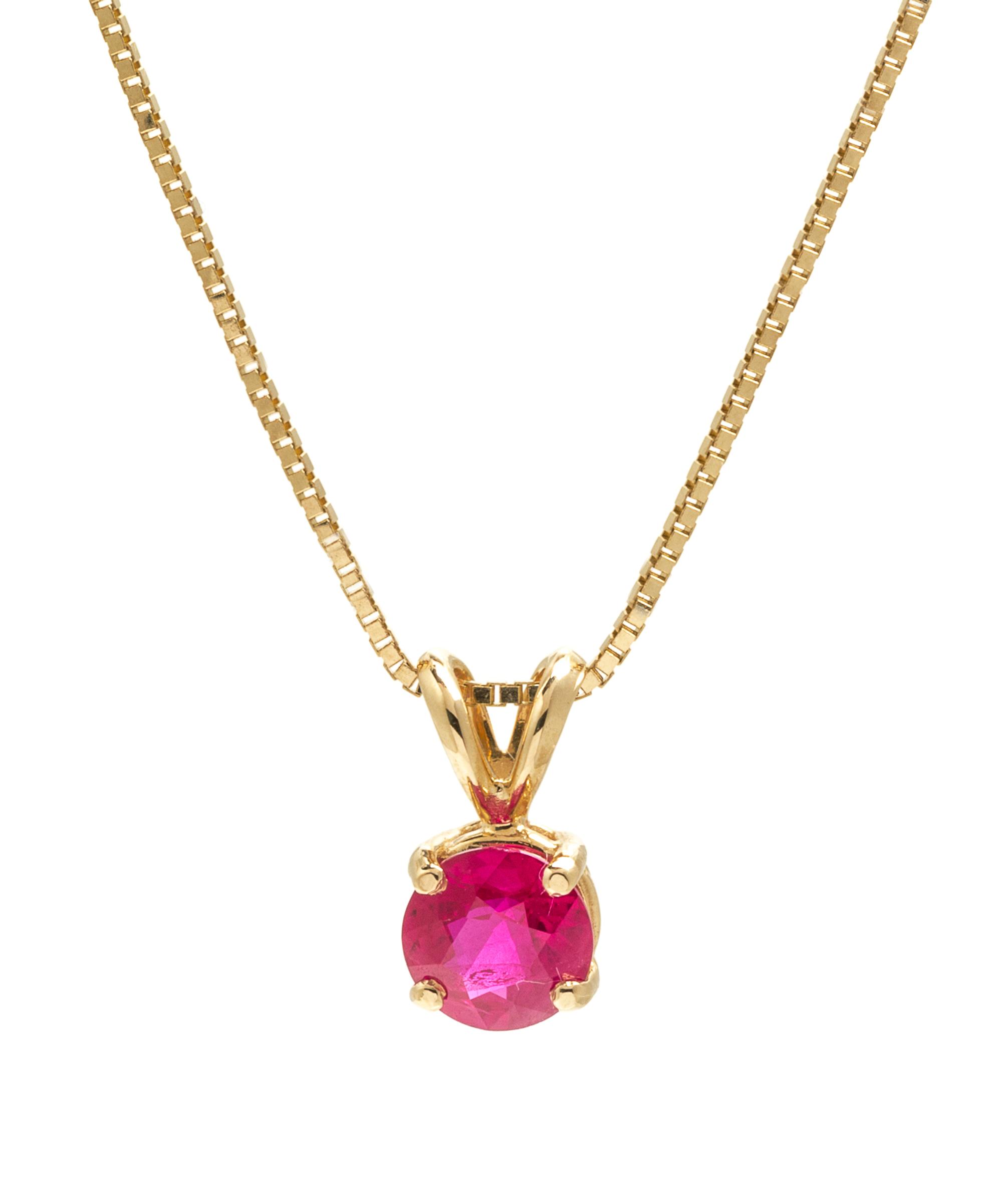 A Yellow Gold and Ruby Pendant, 2.20 dwts.