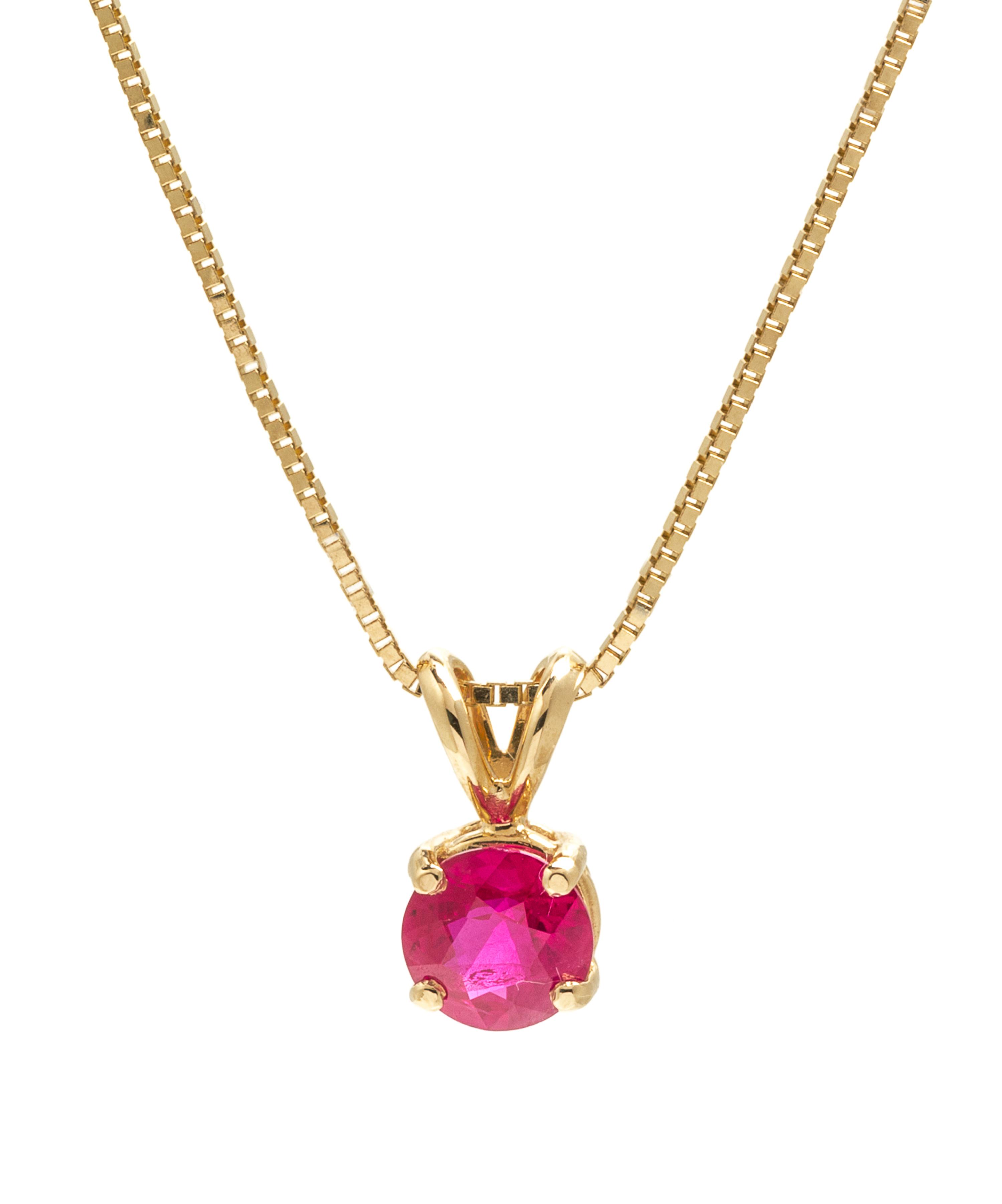 A Yellow Gold and Ruby Pendant, 2.20 dwts.