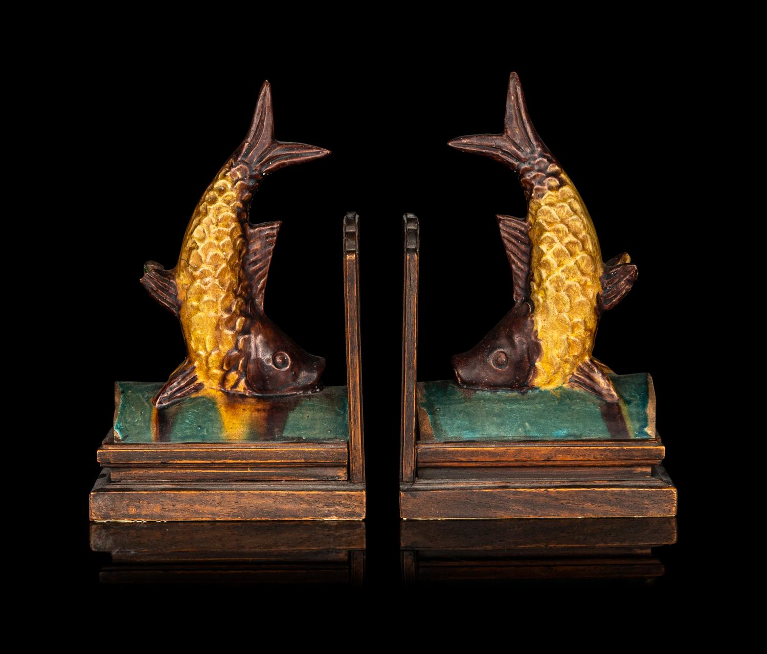 A Pair of Chinese Green and Yellow Glazed Stoneware Fish-Form Roof Tiles