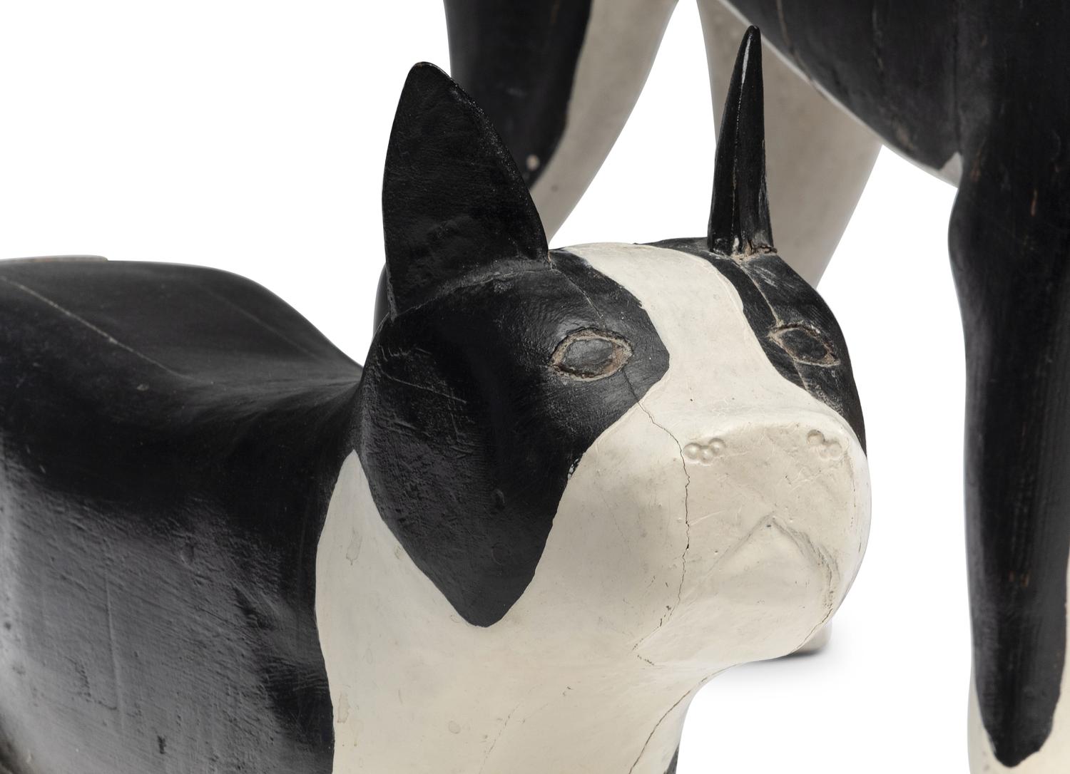 A Set of Four Carved and Painted Wood Boston Terrier Figures