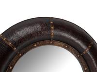A Pair of Portuguese Style Embossed Leather Circular Mirrors