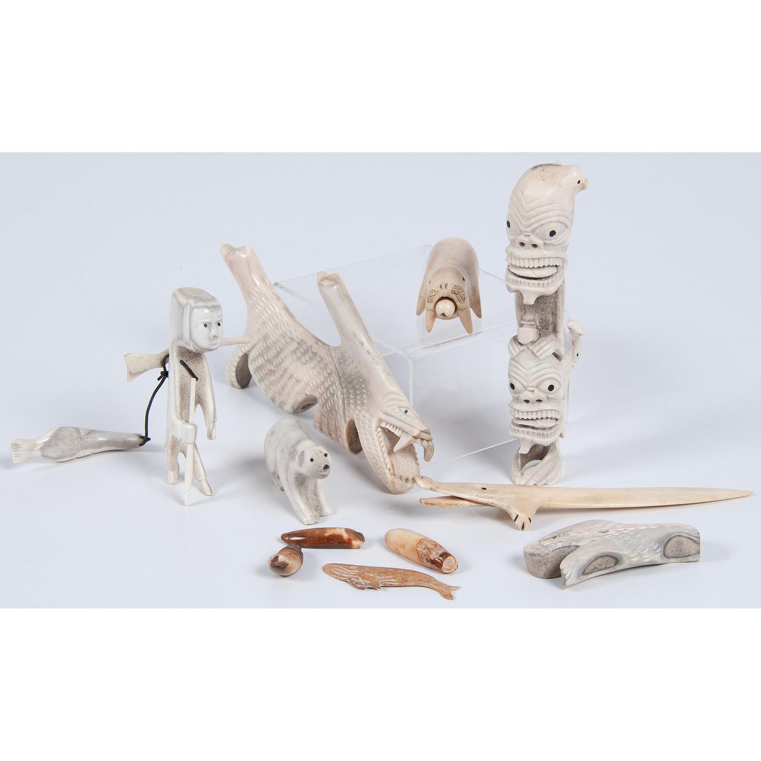 Collection of Alaskan Eskimo and Greenlandic Inuit Whale Bone and Walrus Ivory Tupilaks and Carvings — lot of 10