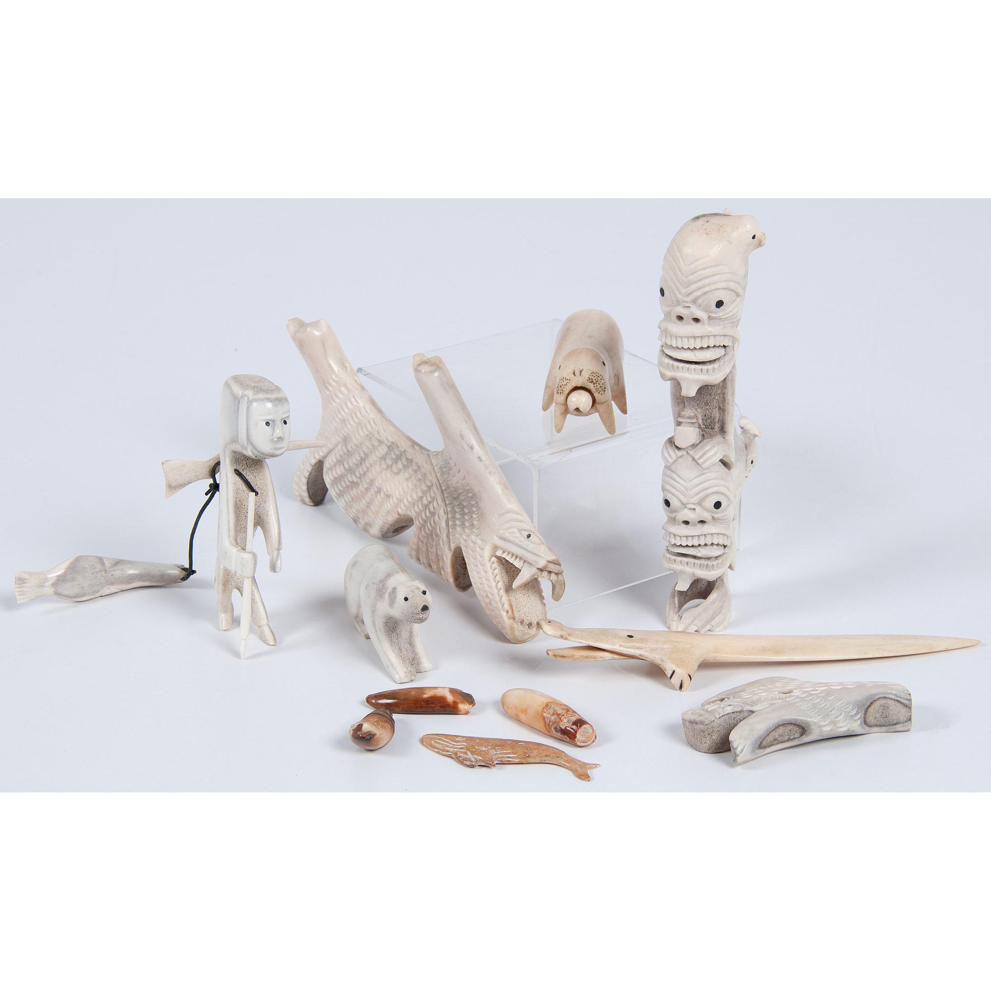 Collection of Alaskan Eskimo and Greenlandic Inuit Whale Bone and Walrus Ivory Tupilaks and Carvings — lot of 10