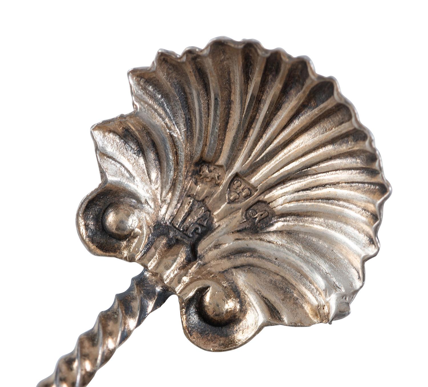 Twenty-Two Silver, Gilt and Enamel Souvenir and Serving Spoons and a Fork