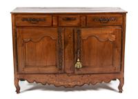 A Louis XV Provincial Inlaid Walnut Buffet