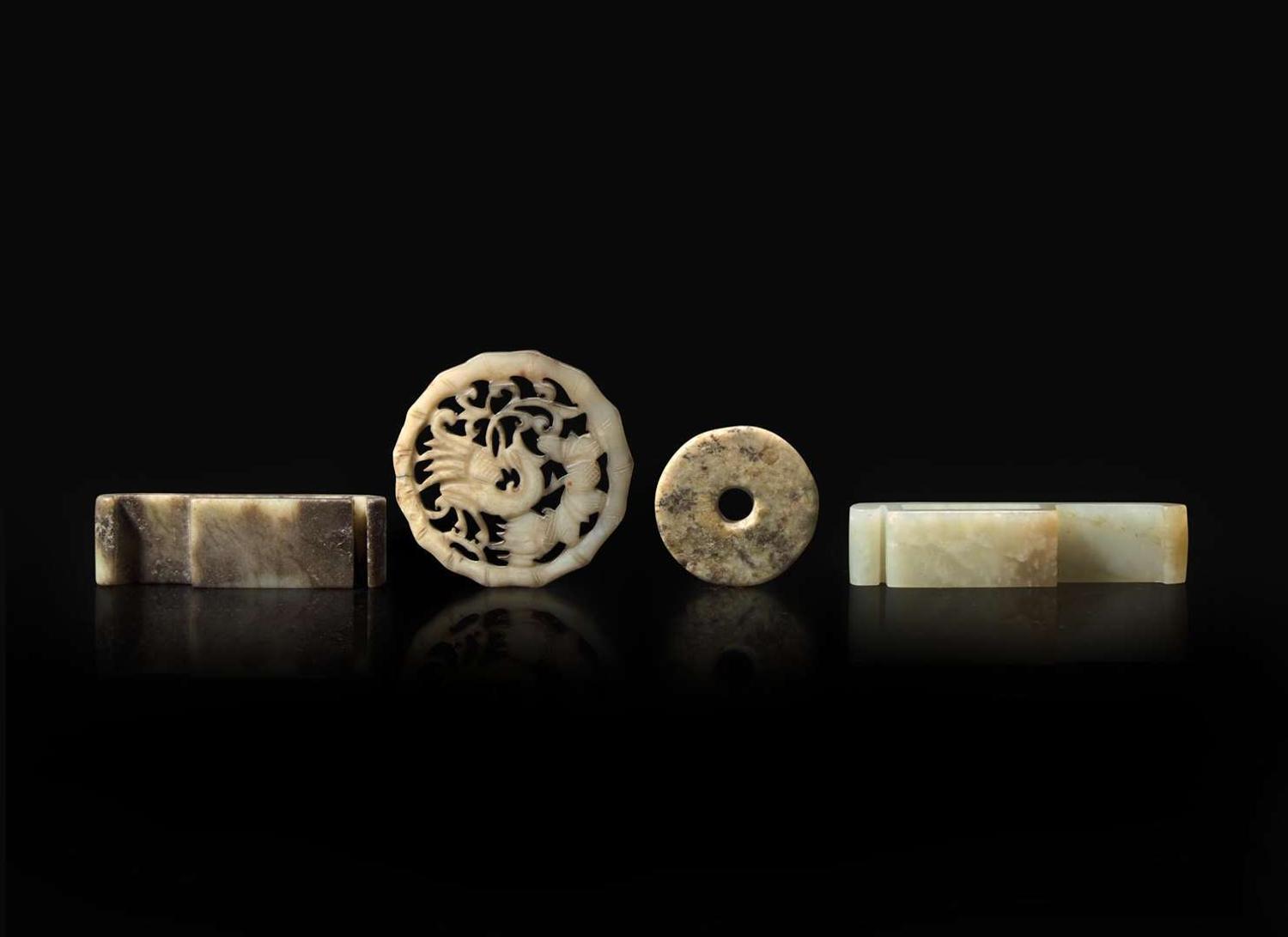 A group of four Chinese assorted jades 劍璏及玉珮一組四件